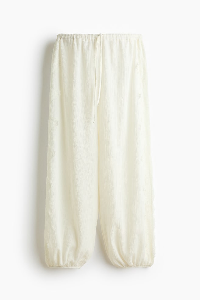 Pantaloni bufanți cu borduri de dantelă - Crem - 1