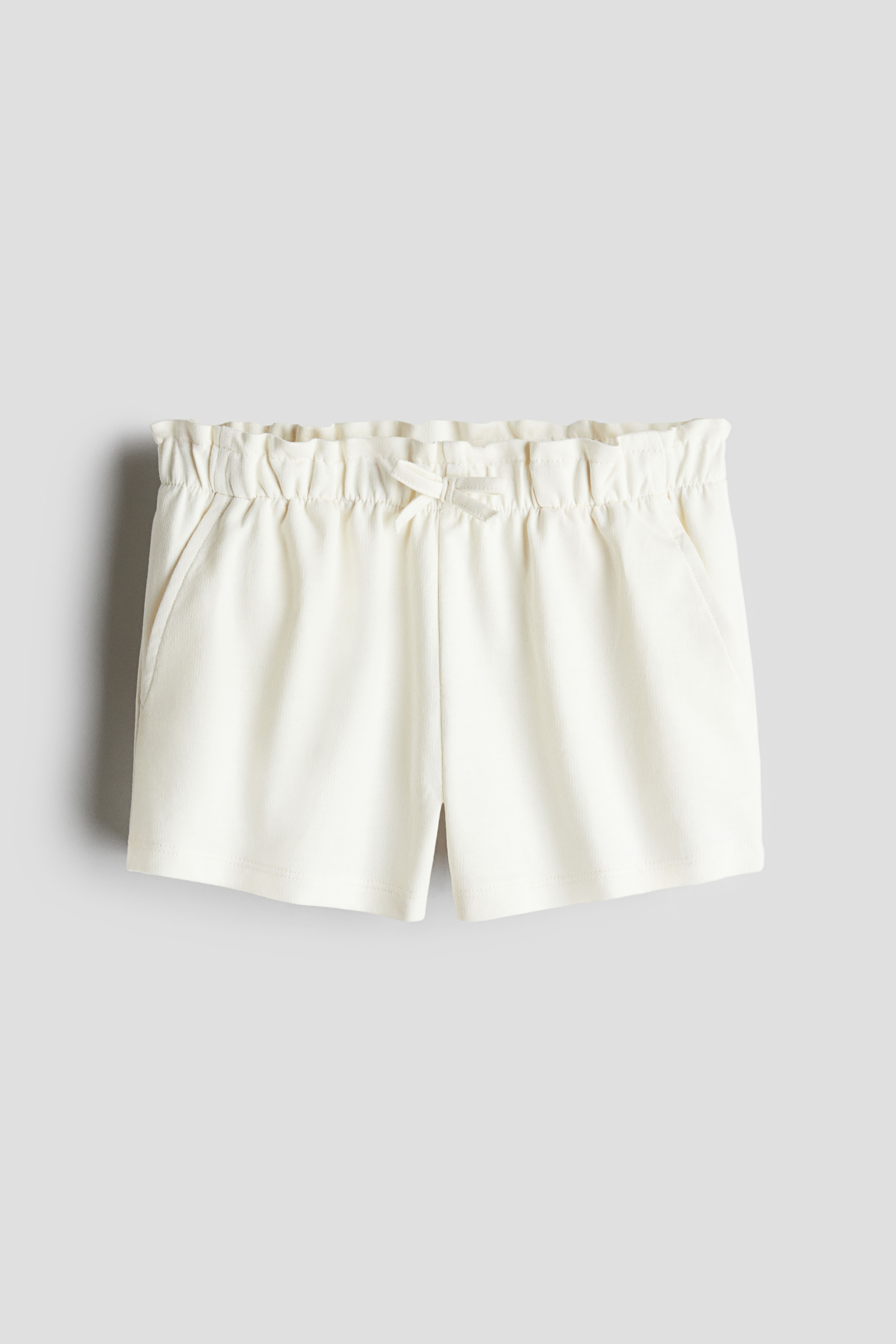 Girls in white shorts hotsell