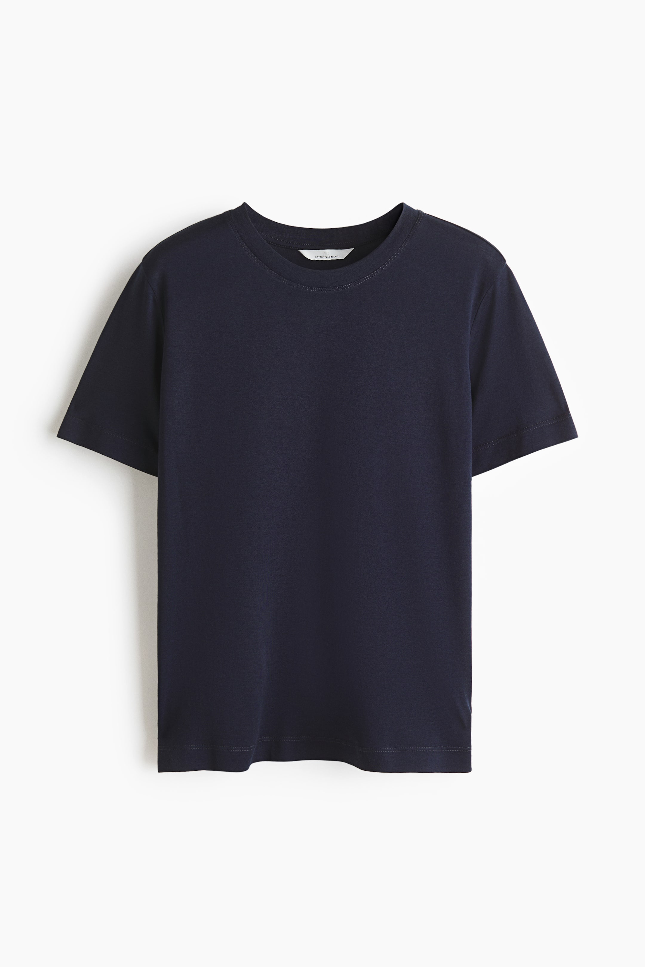 View larger image: A dark blue T-shirt is shown facing front. It features a crew neck, short sleeves, and a straight cut. The fabric appears smooth.