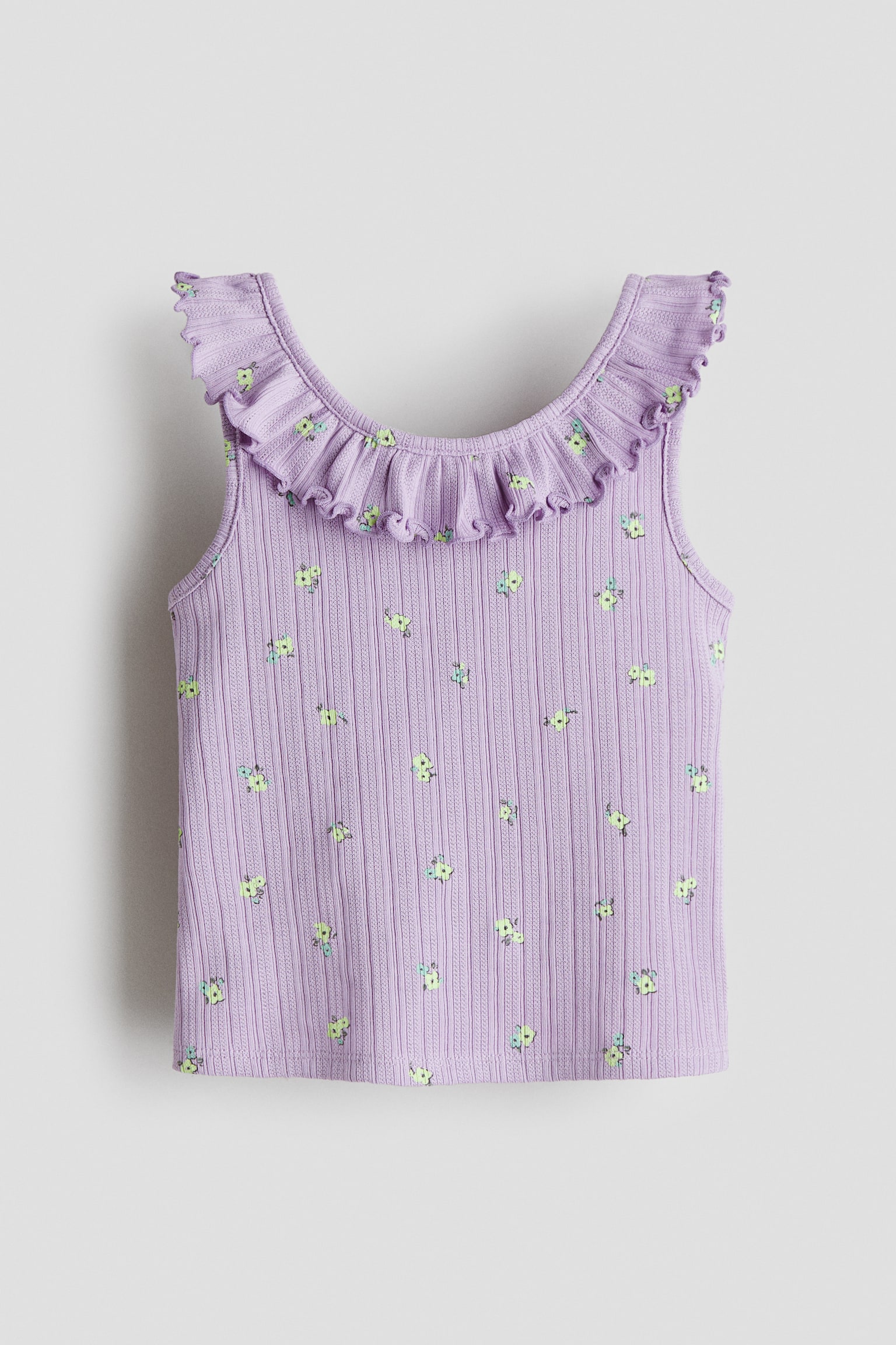 Top sin mangas en pointelle con olanes - Morado/Floreado/Crema/Floreado