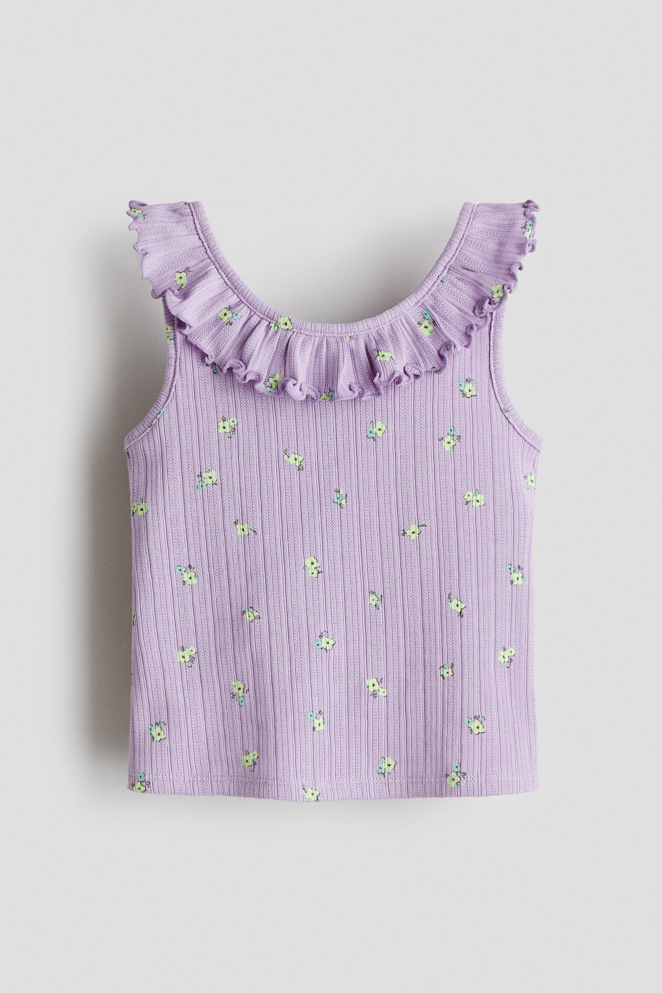 Ampliar la imagen: Top sin mangas en pointelle con olanes - Morado/Floreado - Kids | H&M MX 1