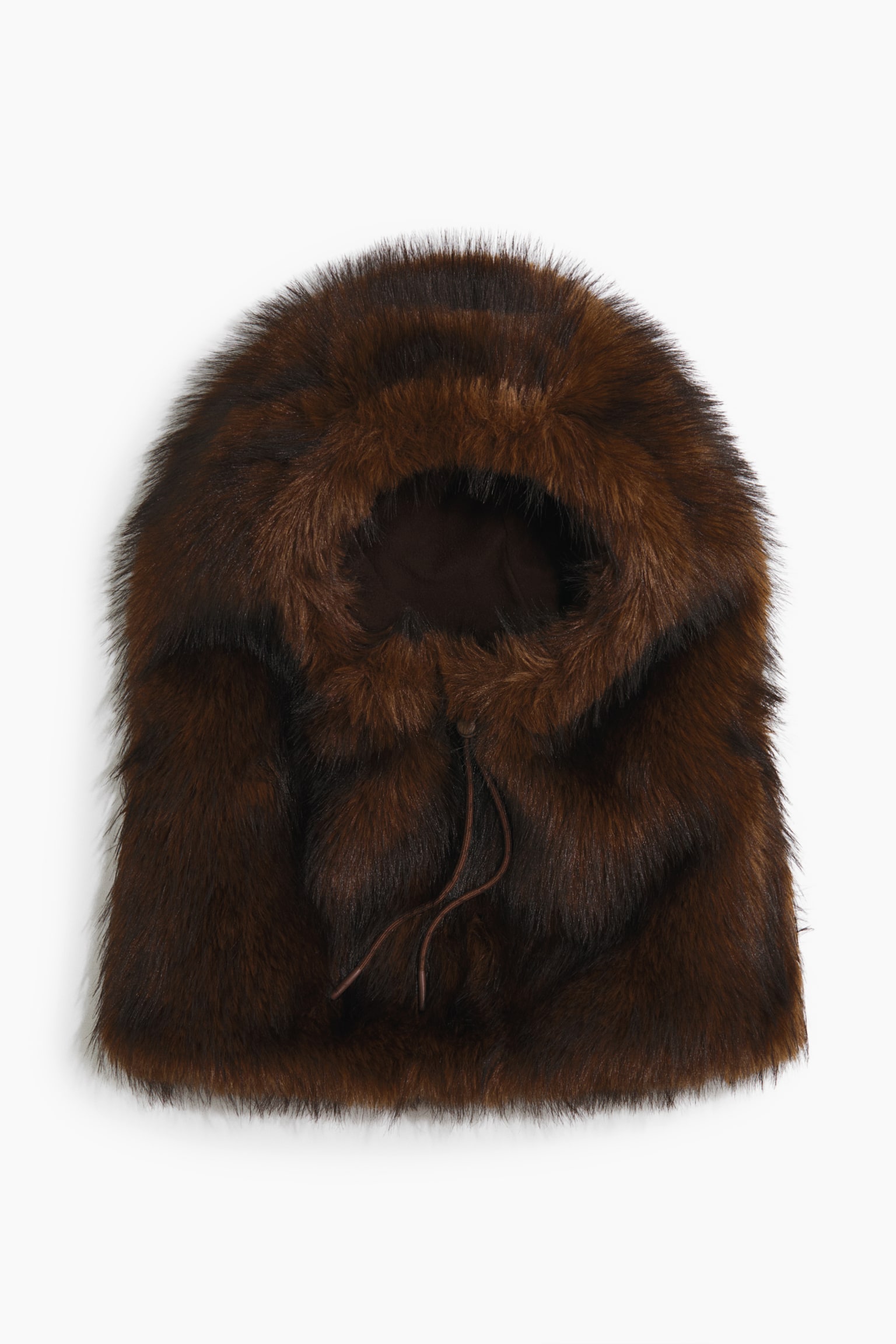 A brown faux fur hood is facing forwards, displaying a plush, textured pile and a large face opening. It features thin brown drawstrings hanging from the front neck area and a wide, flared bottom edge. - 1