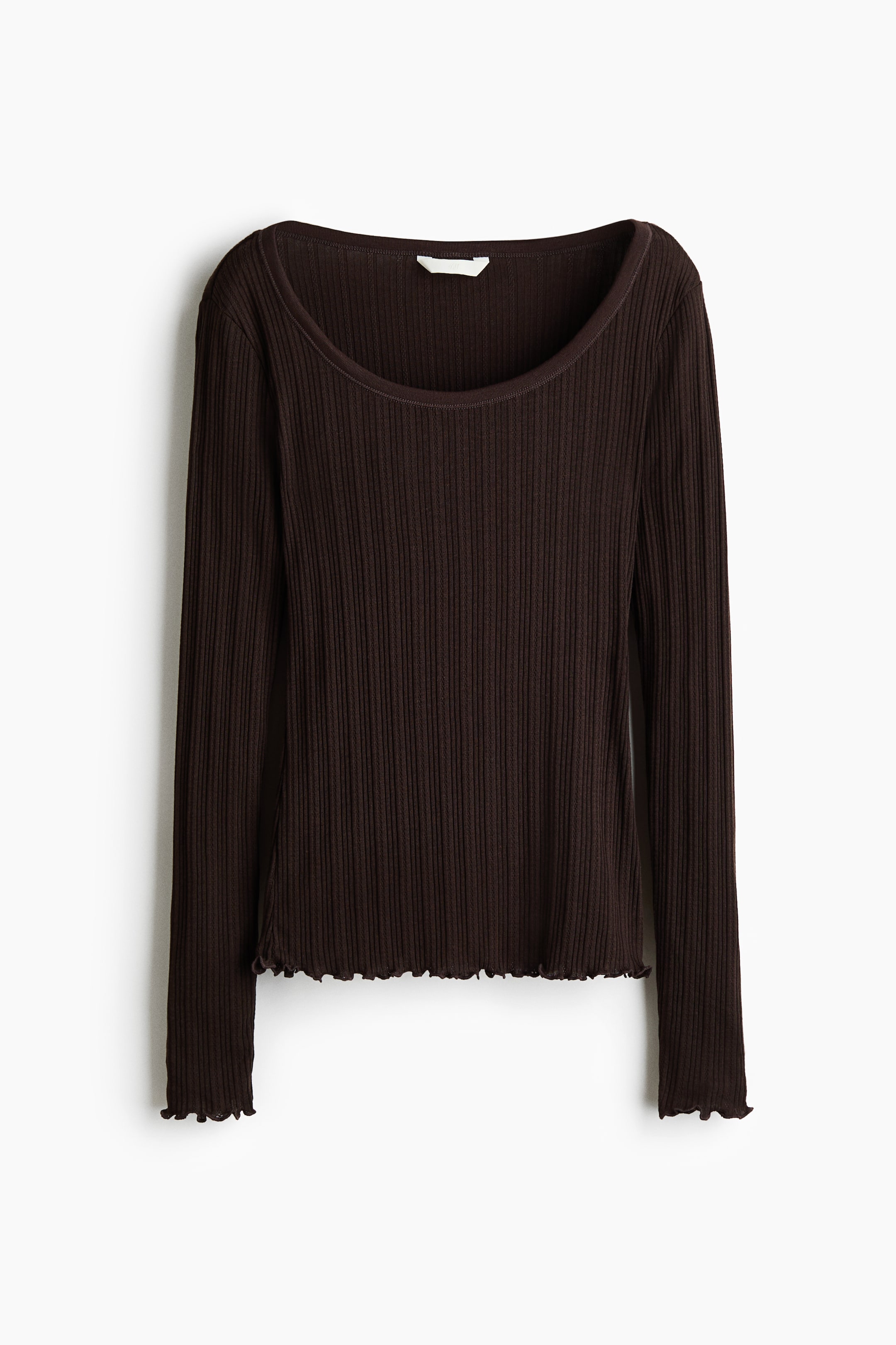 View larger image: A dark brown ribbed long-sleeve top is being displayed from the front, featuring a scoop neck and lettuce-edge hems on the bottom and cuffs.