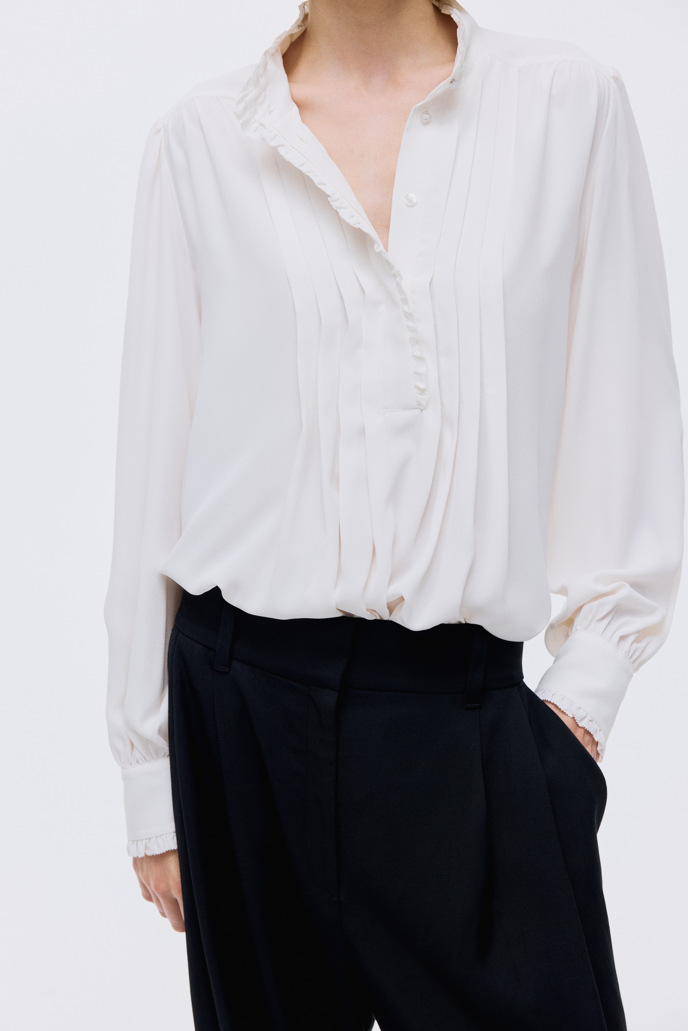 Frill-trimmed blouse