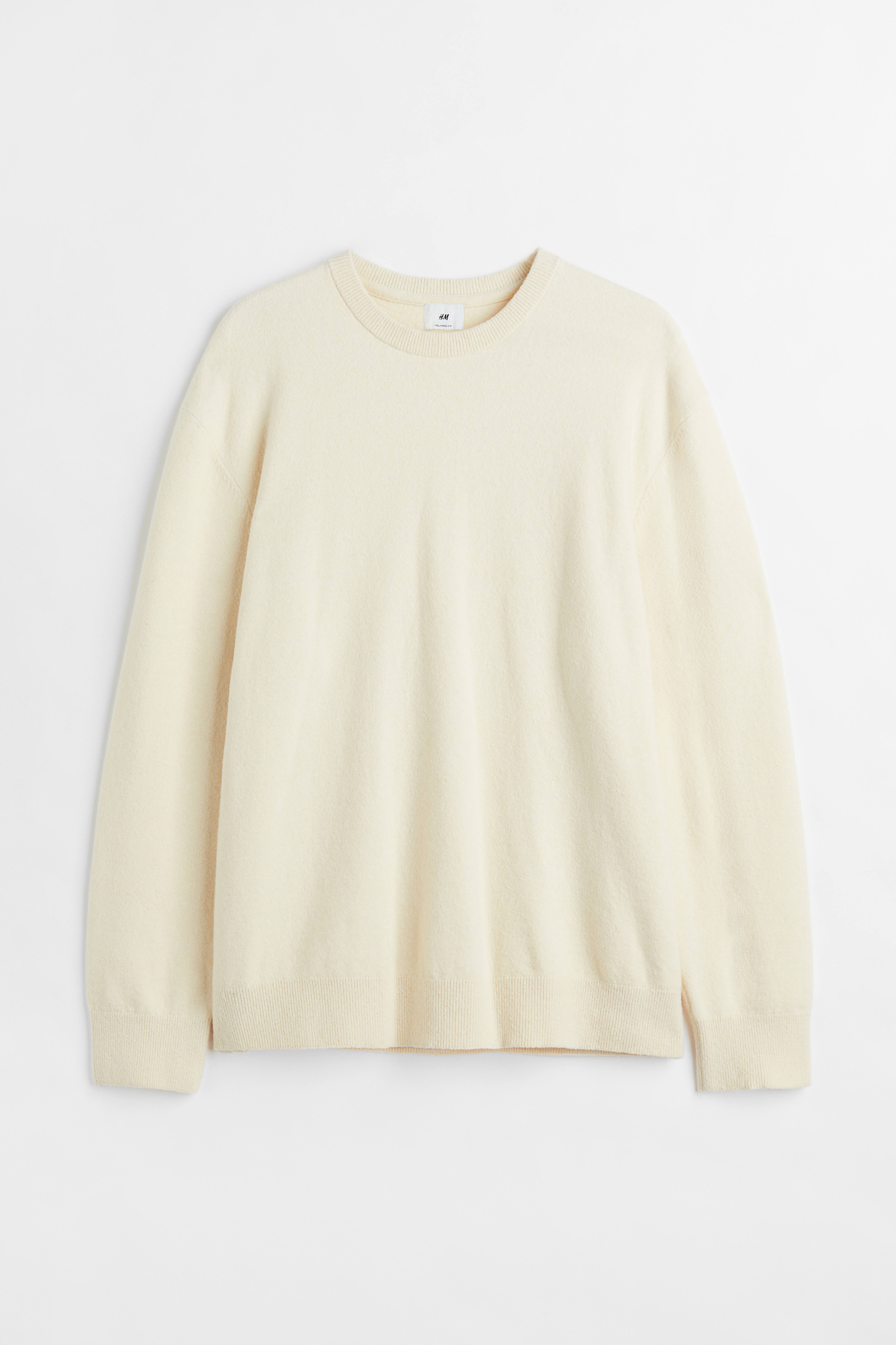 Order Relaxed Cream Sweater.