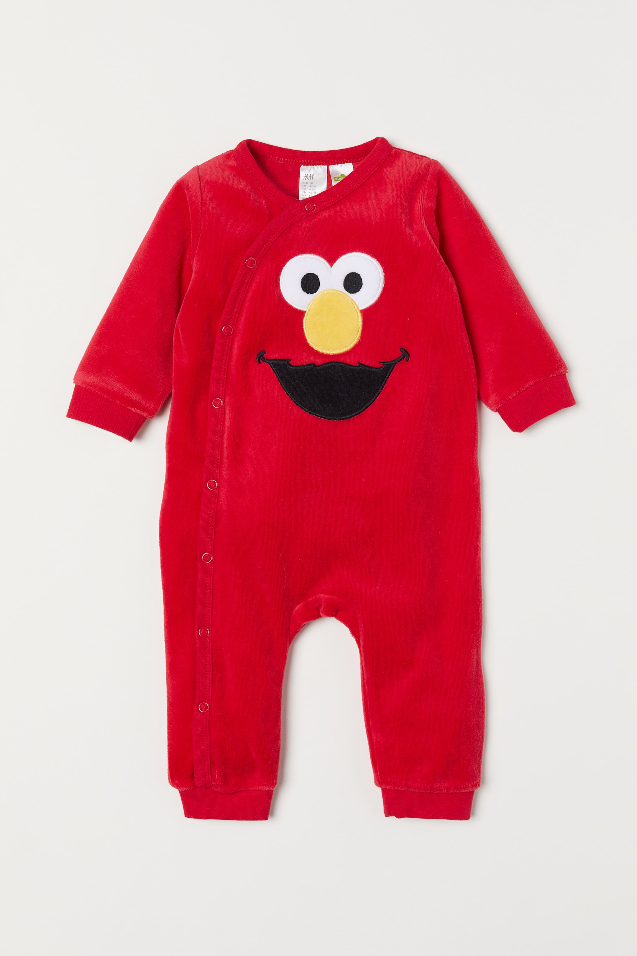 Ingrandisci l'immagine: Pigiama intero in velour - Rosso/Sesame Street - BAMBINO | H&M CH 1