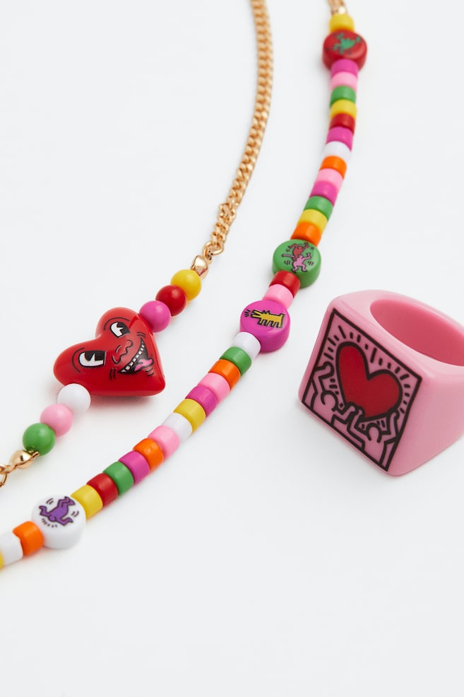 Perlenkette und Ring - Goldfarben/Keith Haring - 2