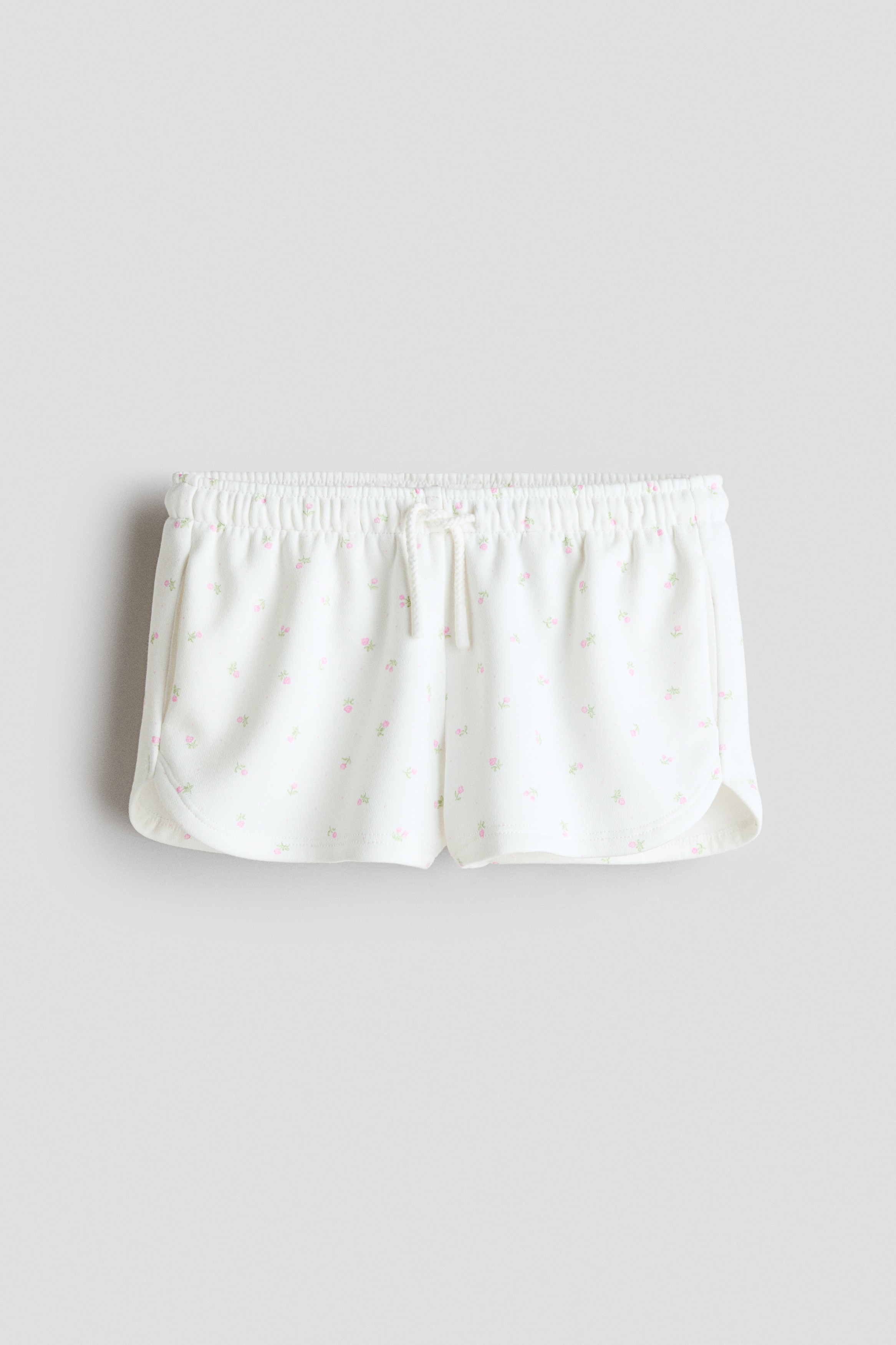 Pantalón corto estampado en sudaderaAuxiliar