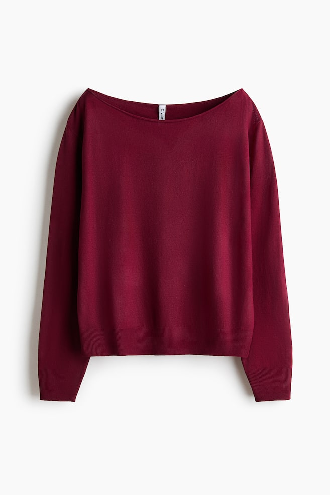 This burgundy fine-knit jumper is shown front on, featuring a wide boat neckline and long sleeves. The jumper has ribbed cuffs and a matching ribbed hem. - 1