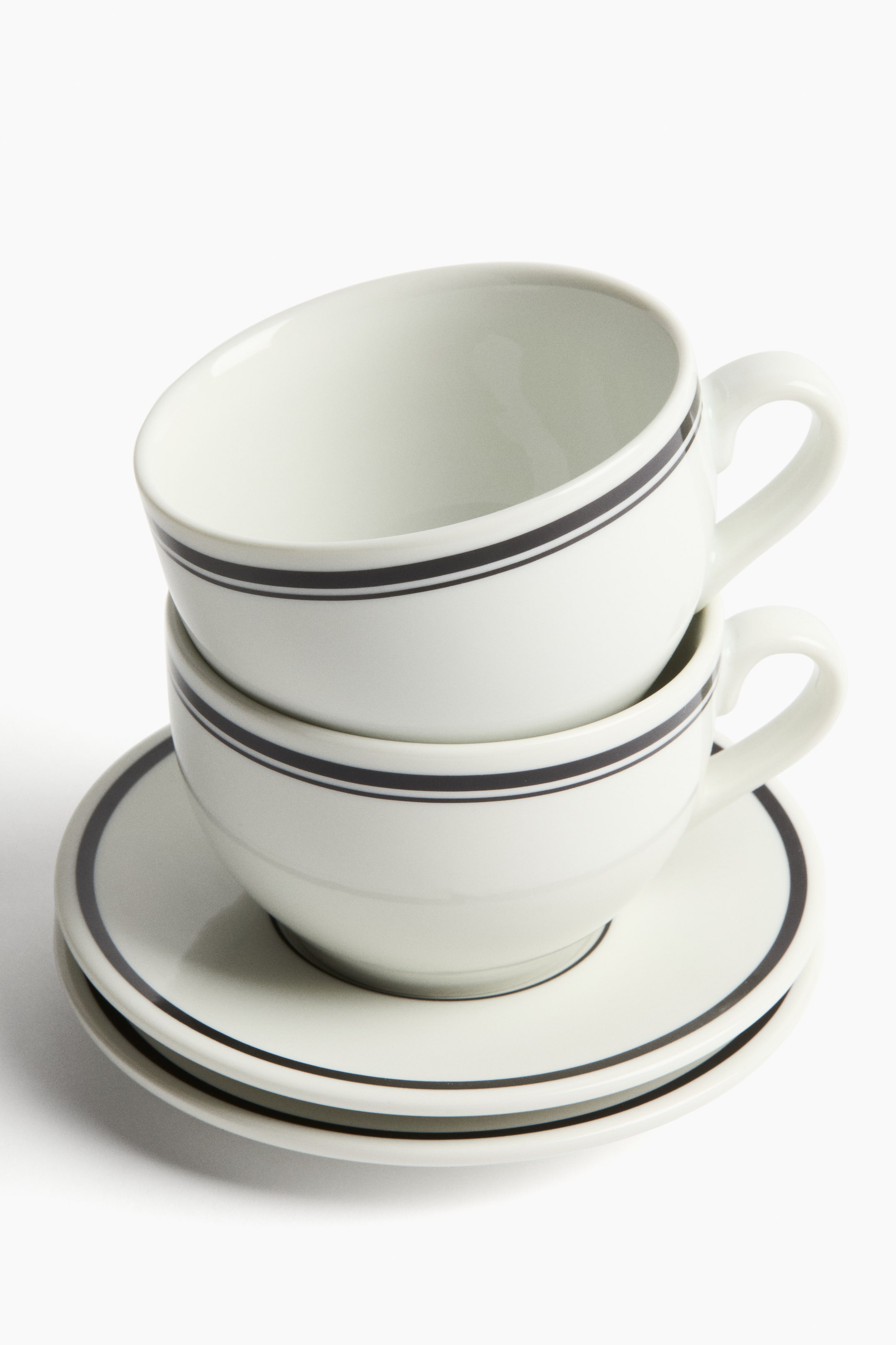 View larger image: 2-Pack Porcelain Cups with Saucers - White/black | H&M US 2