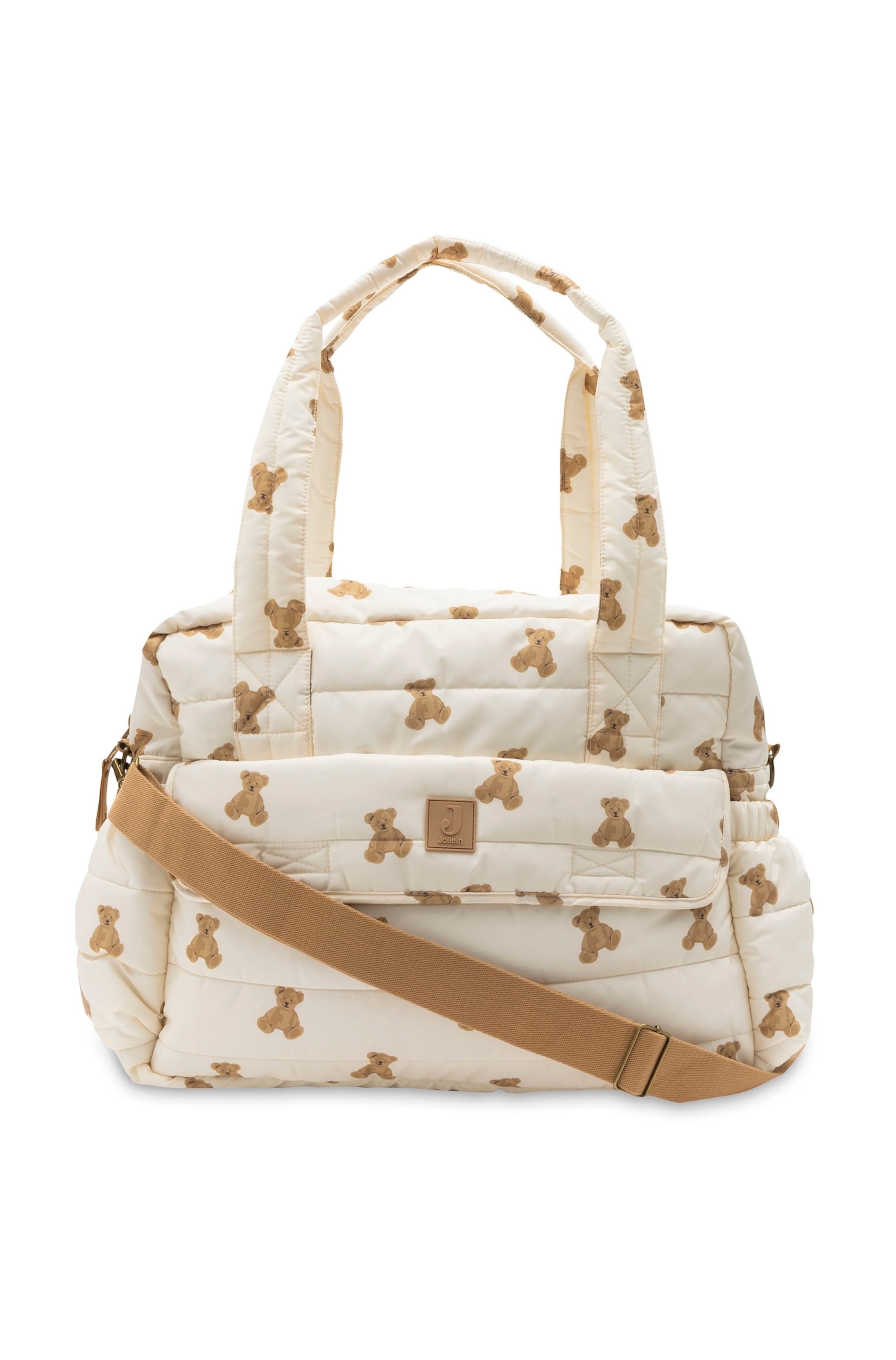 Agrandir l'image: Le sac matelassé crème avec un imprimé d'ours en peluche marron est positionné frontalement, affichant deux poignées supérieures rembourrées, une poche à rabat avant arborant un écusson logo "Jollein", et une bandoulière marron ajustable traversant son devant.