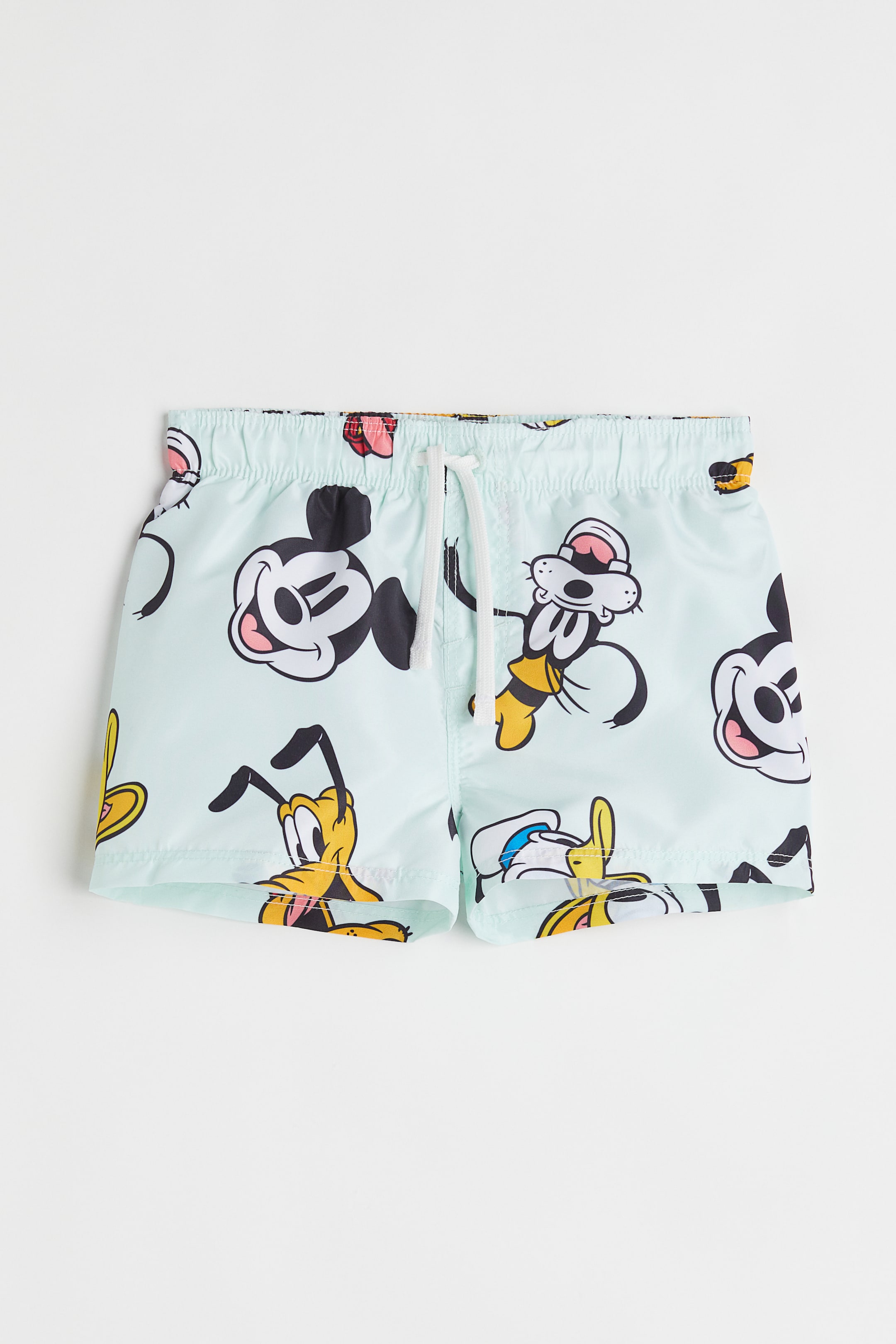 Patterned Swim Shorts - Light mint green/Mickey Mouse - Kids | H&M US