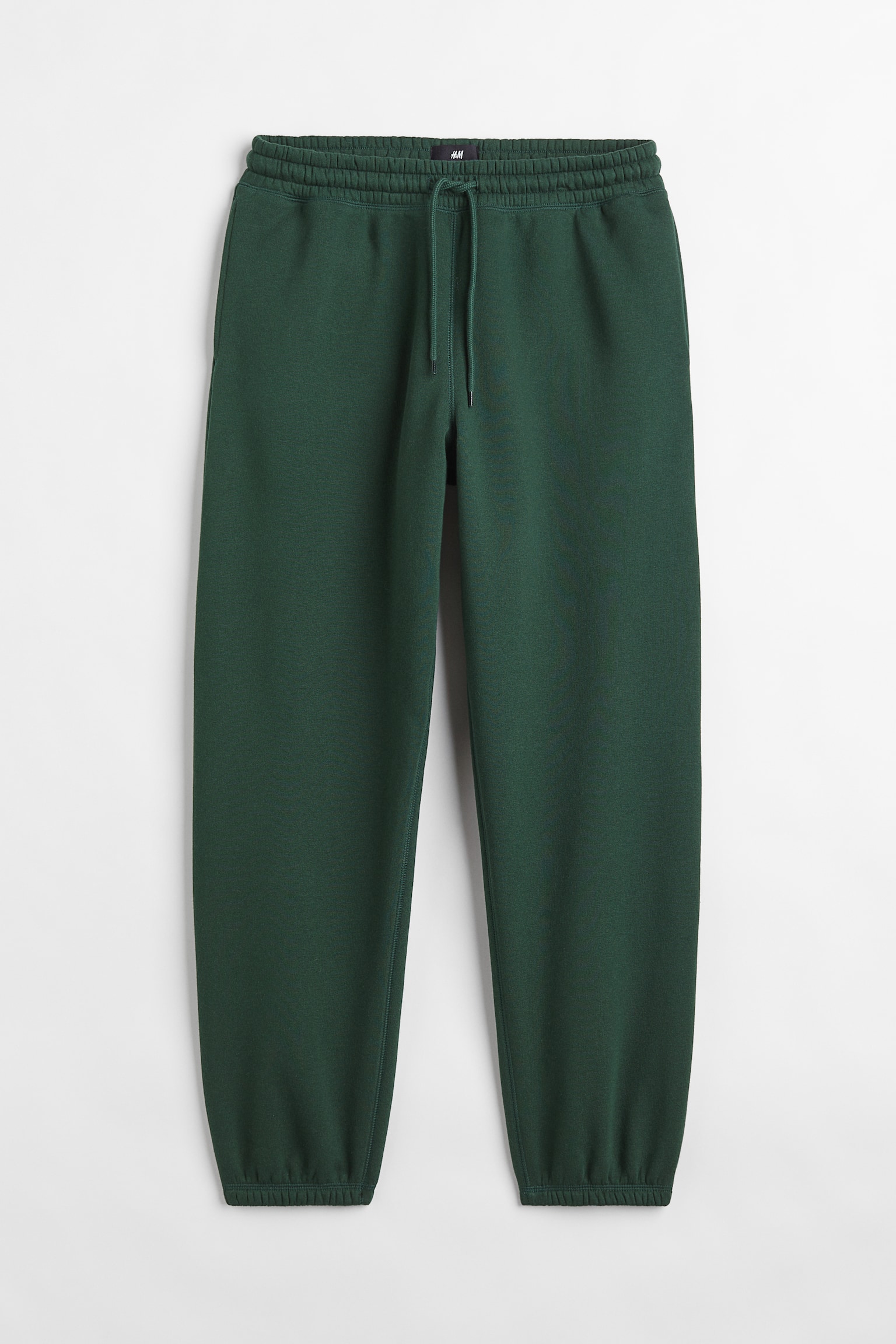 Loose Fit Sweatpants - Regular waist - Long - Dark green - Men | H&M US