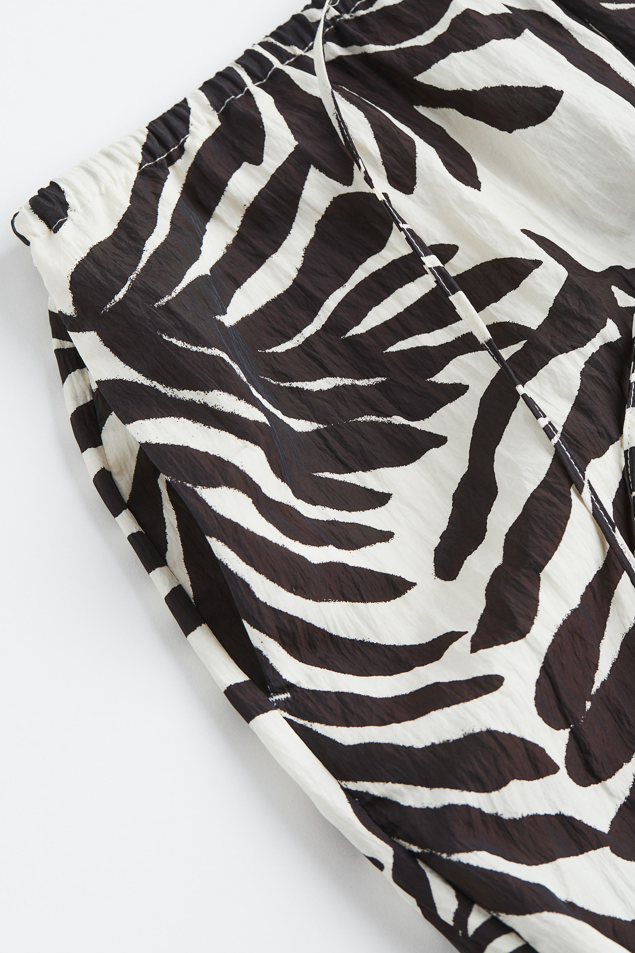 View larger image: Wide pull-on trousers - White/Leaves - Ladies | H&M IN 3