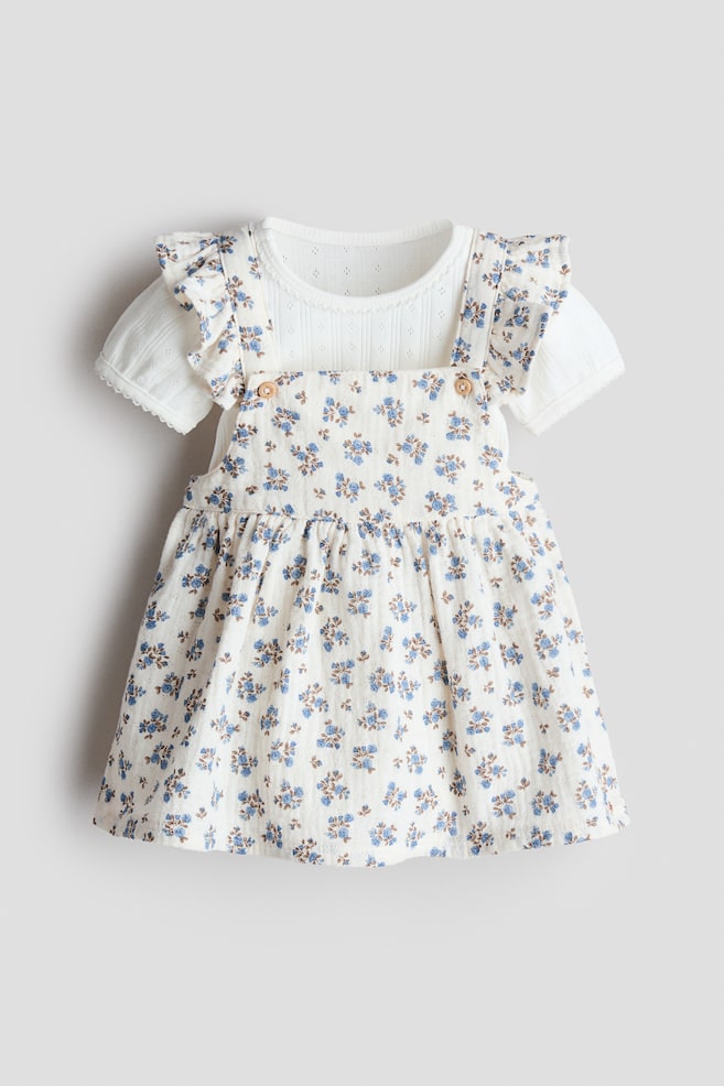 Kleid aus bedrucktem Baumwollmusselin - Cremefarben/Geblümt - 1
