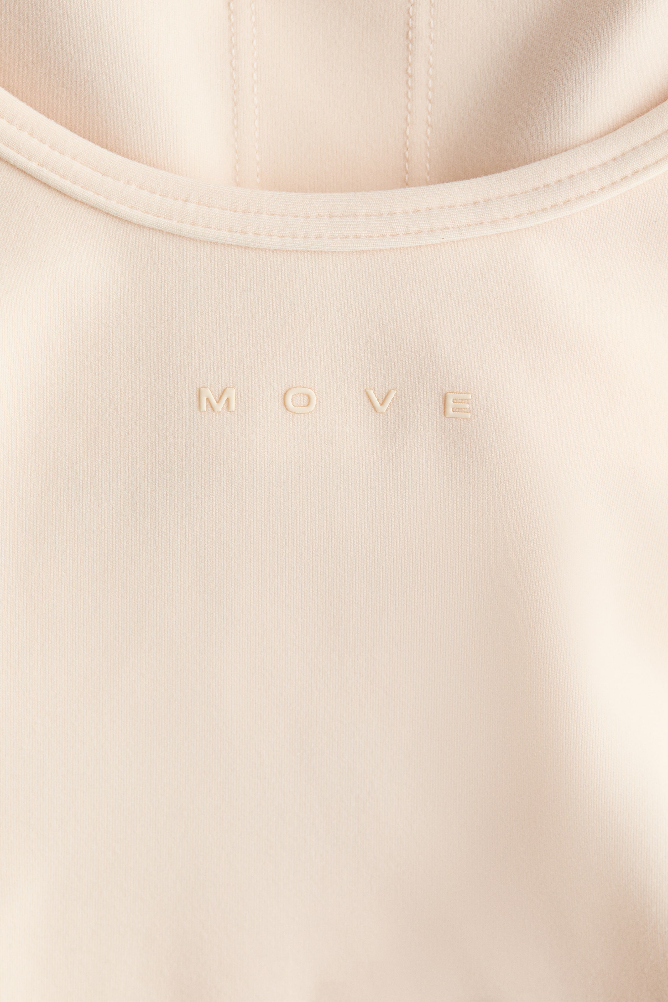 Visa större bild: Träningstopp i SoftMove™ med inbyggd sport-bh - Ljus aprikos - DAM | H&M SE 2