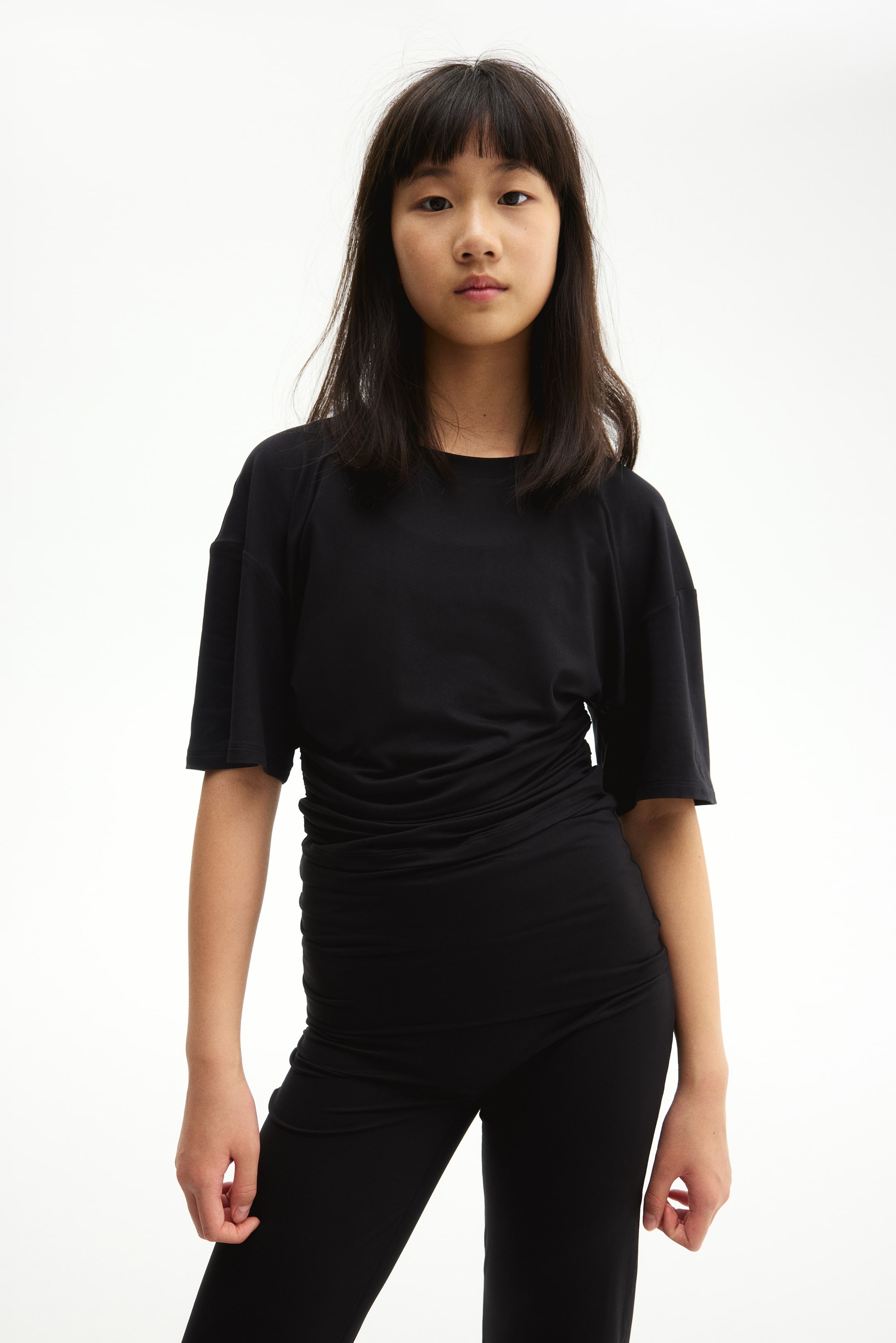 Ampliar la imagen: Sports top with SoftMove™ - Negro - Kids | H&M MX 2