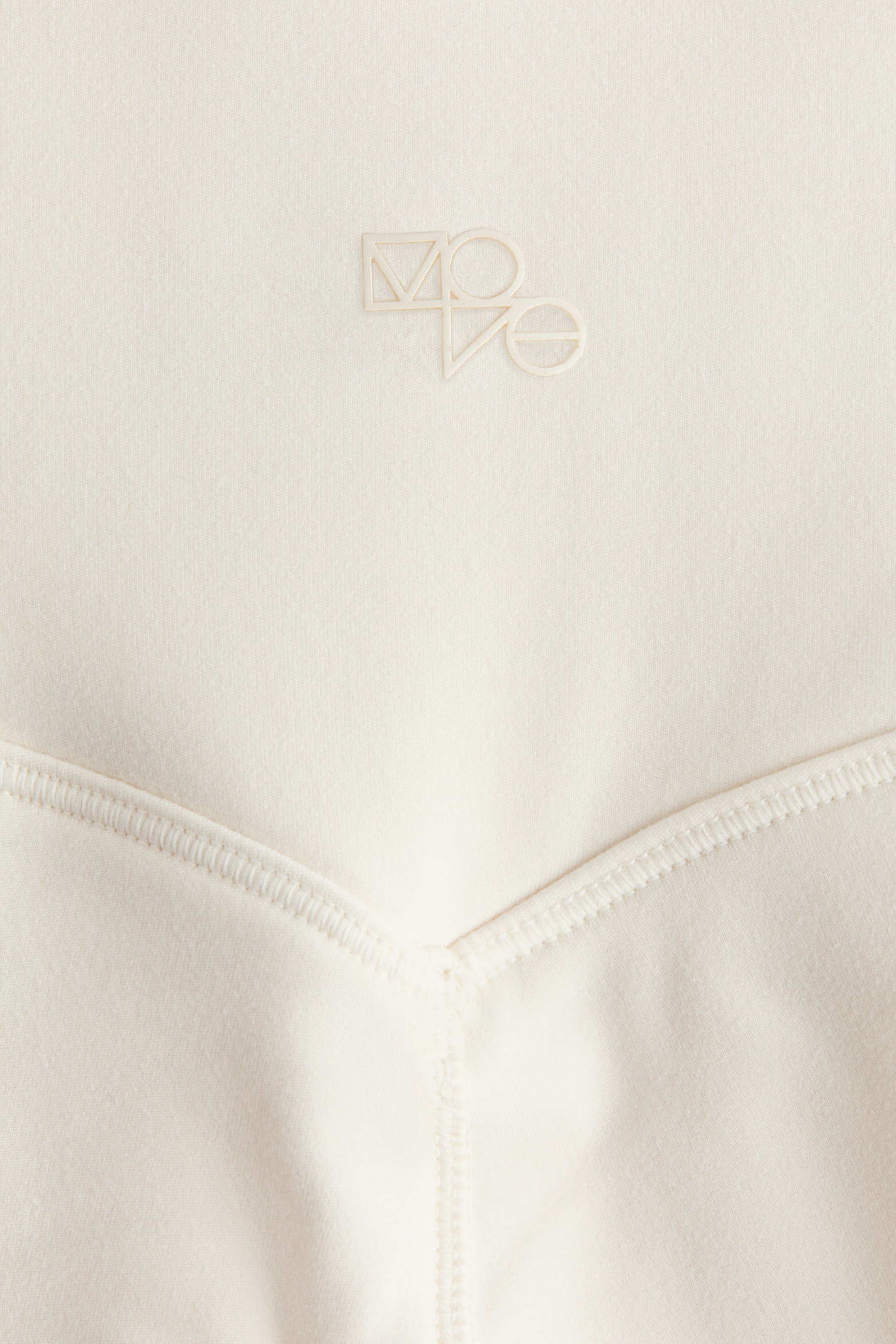 Größeres Bild anzeigen: Ausgestellte Sport-Fleeceleggings mit SoftMove™ - Elfenbein - Ladies | H&M AT 9