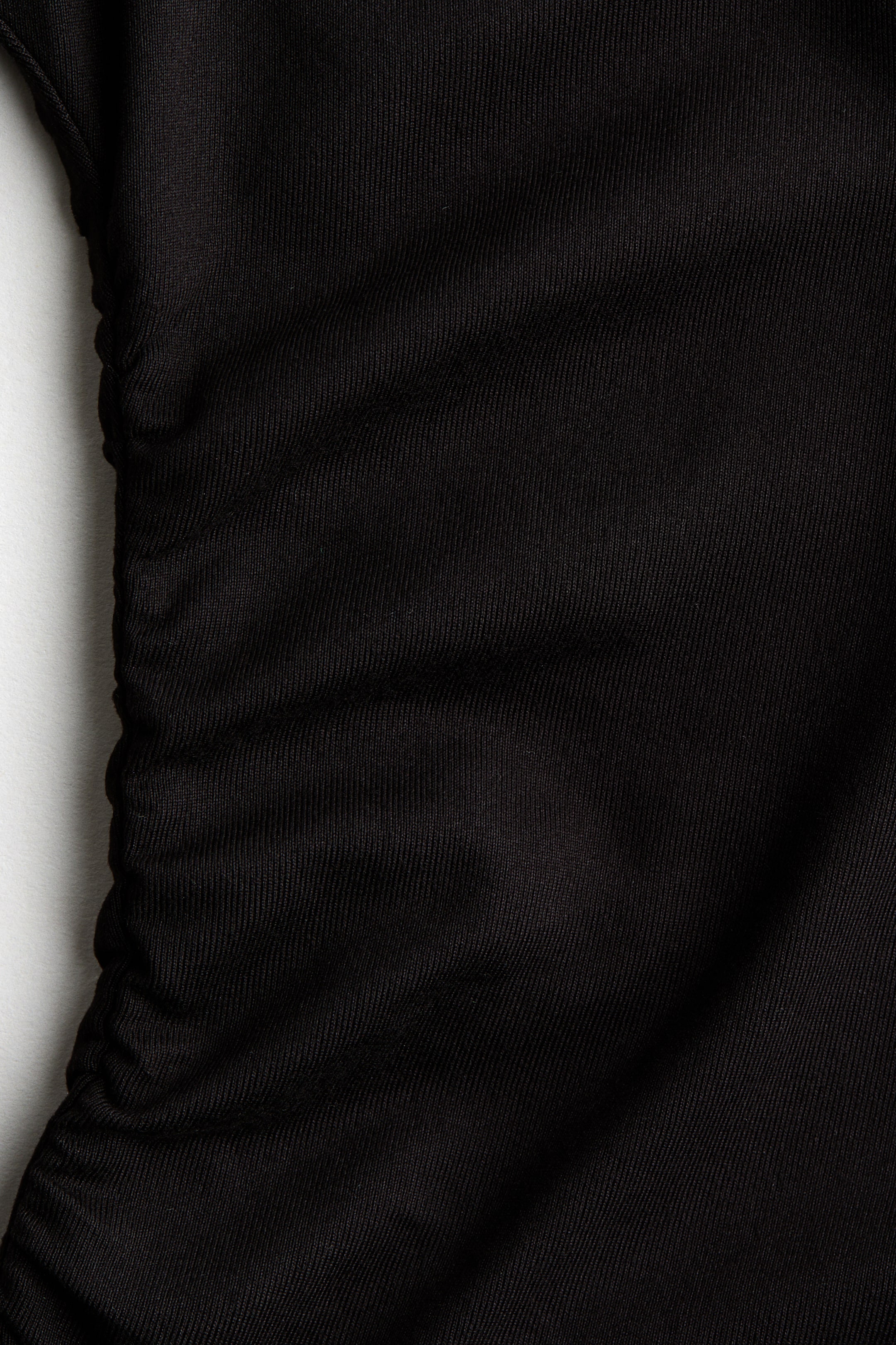 Ampliar la imagen: Sports top with SoftMove™ - Negro - Kids | H&M MX 7