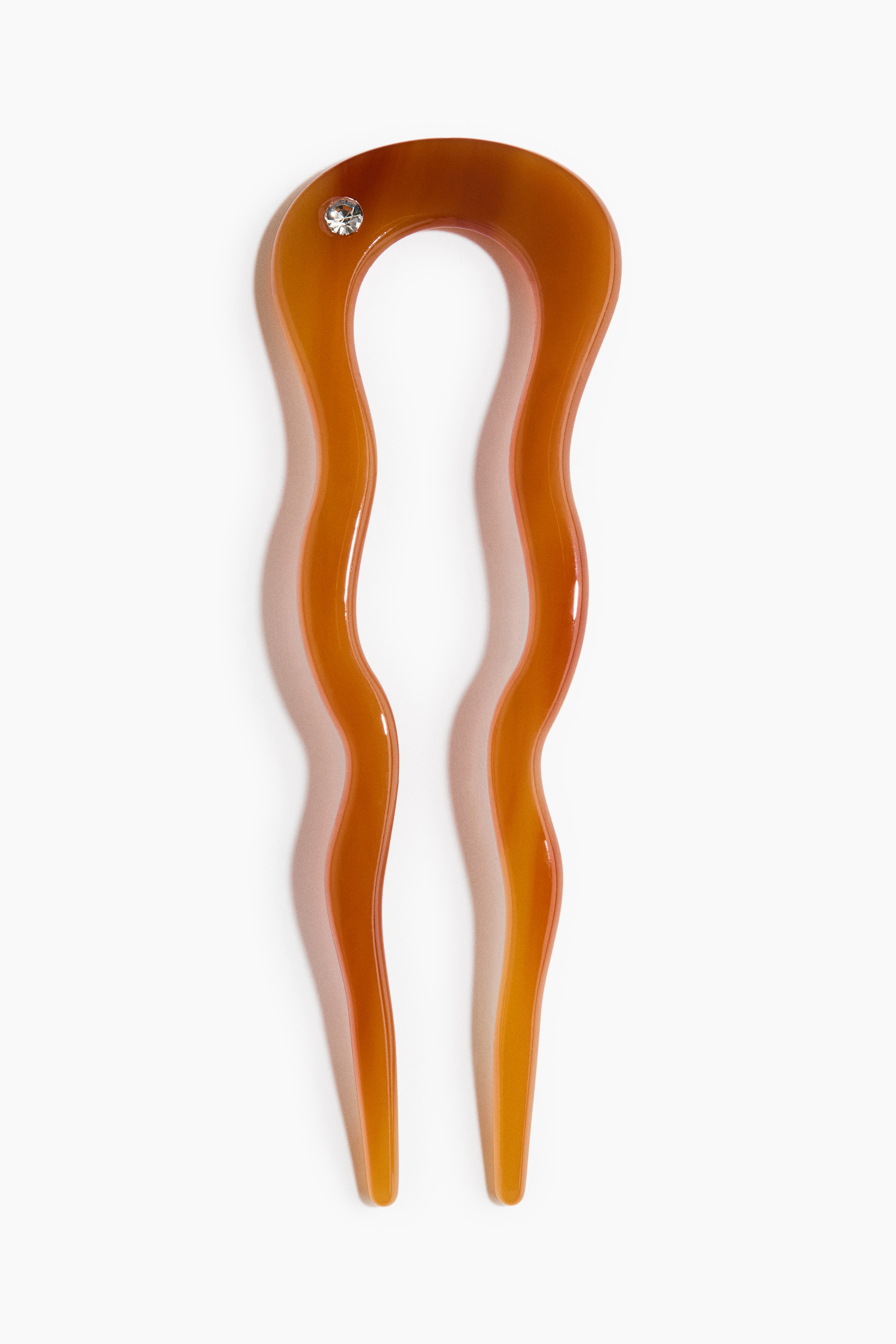 Pic à cheveux onduléModèle