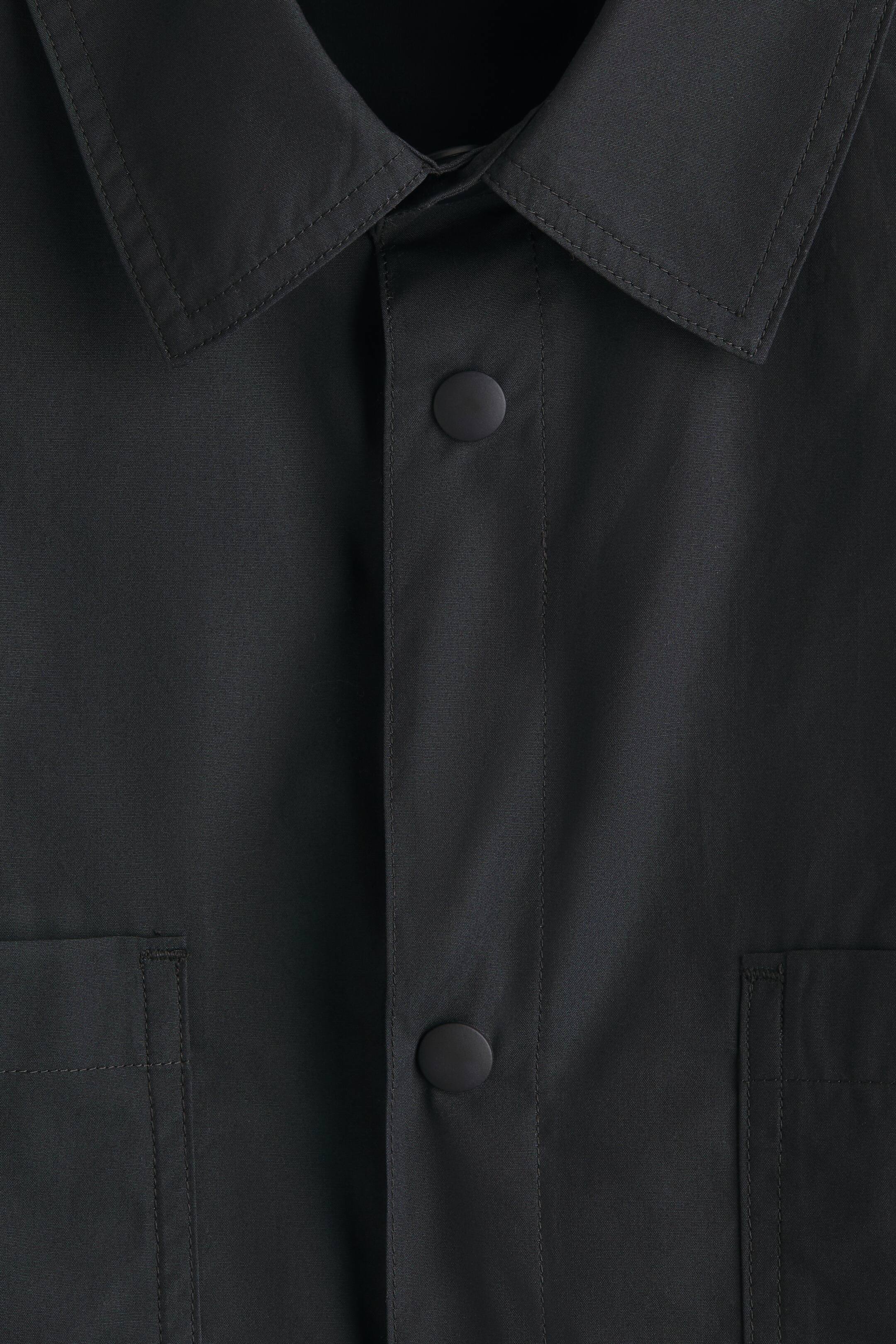 Xem ảnh lớn hơn: Loose Fit Short-sleeved cotton shirt - Màu đen - Men | H&M VN 6