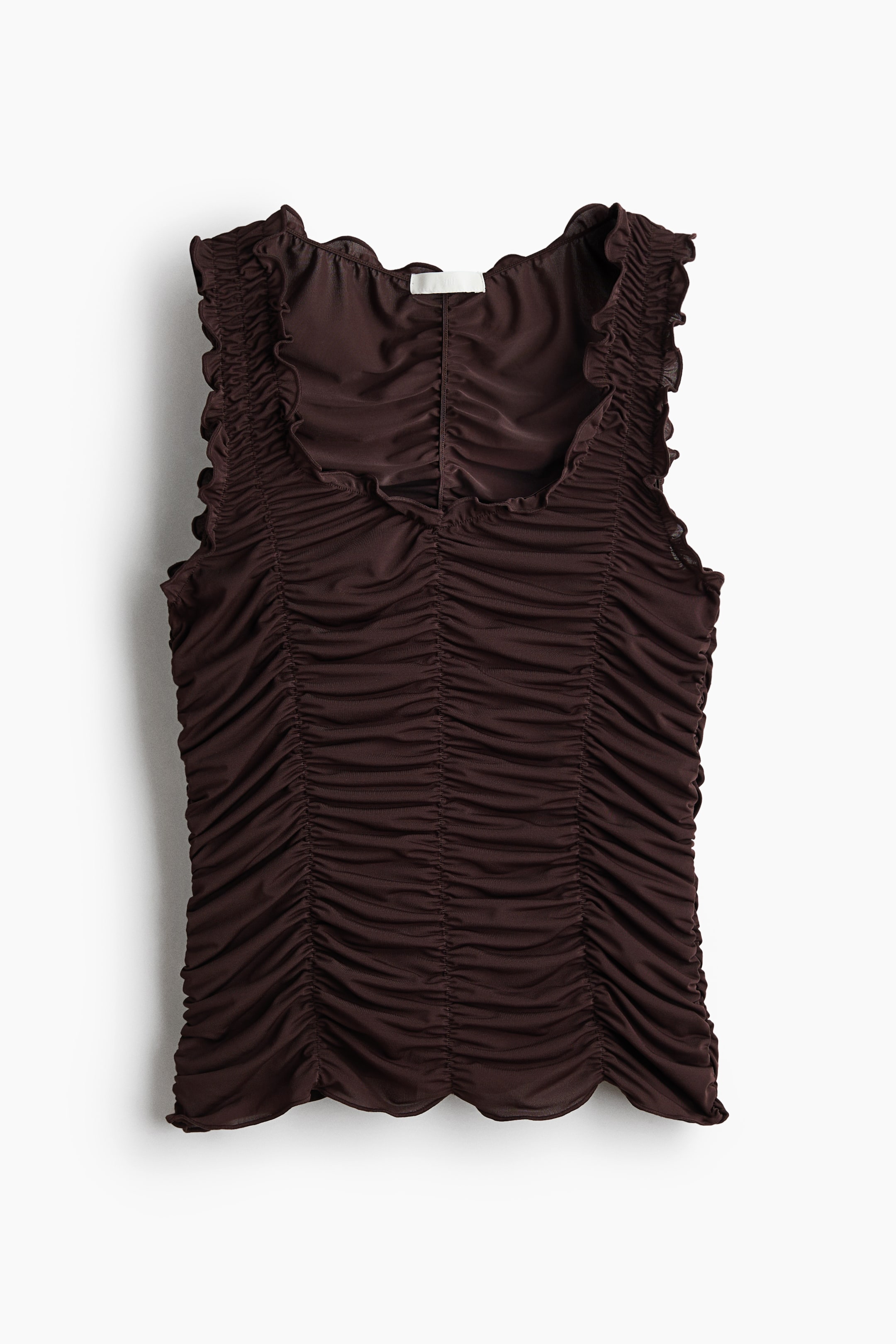 View larger image: A dark brown sleeveless top with extensive vertical ruching throughout its body. Designed with a wide ruffled neckline, ruffled armholes, and a scalloped bottom hem.