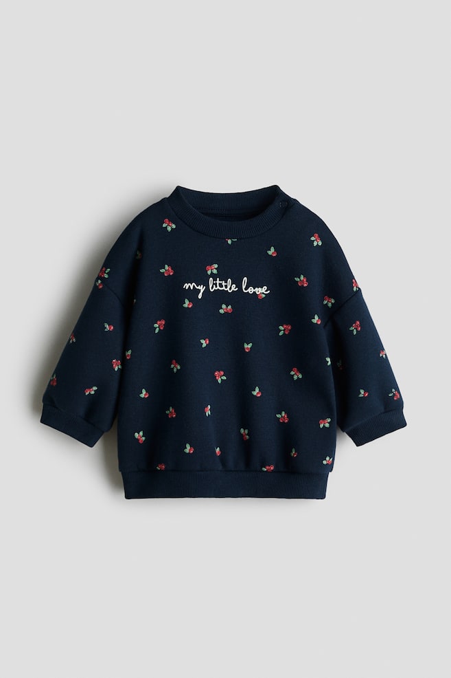 Sweatshirt estampada com o interior cardado - Azul marinho/Airelas/Rosa claro/Fantasma/Bege/Padrão leopardo/Cinzento/Corações/Verde menta/Floral - 1
