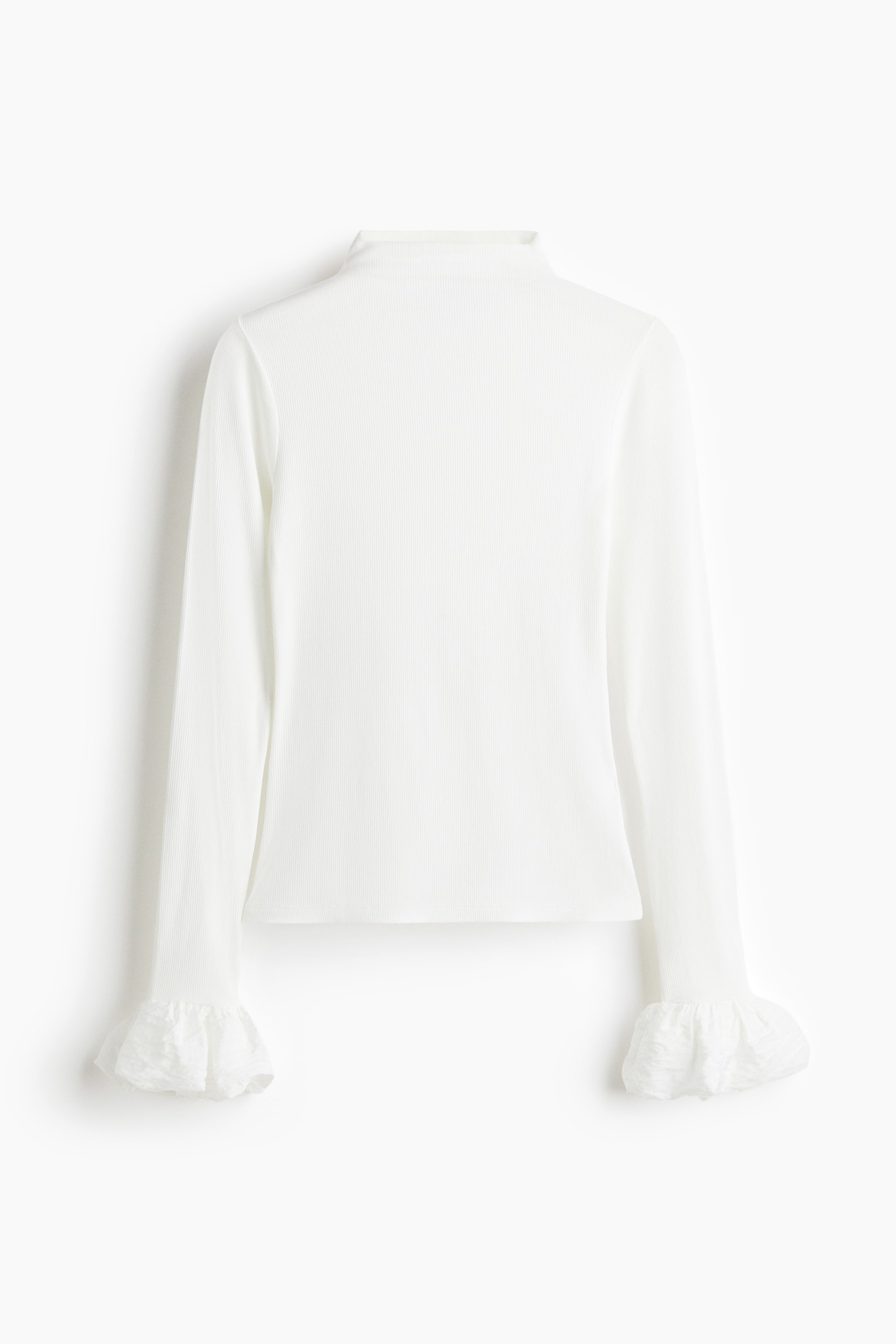 View larger image: A white long-sleeved top is presented from the back, featuring a mock neck and a vertical ribbed texture. Its long sleeves end with gathered, ruffled cuffs made of a sheer, crinkled fabric.