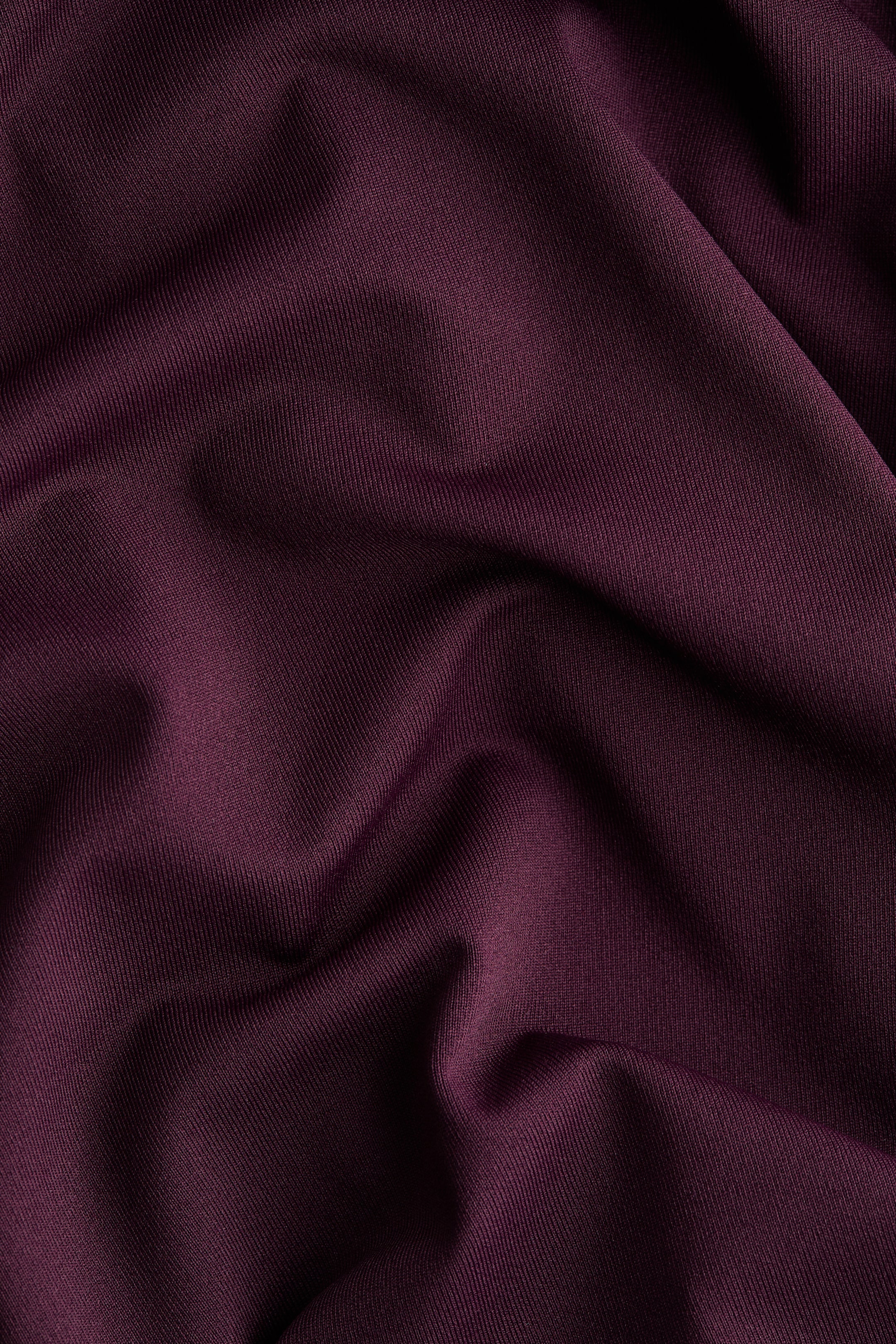 Maillot tanga à manches longues