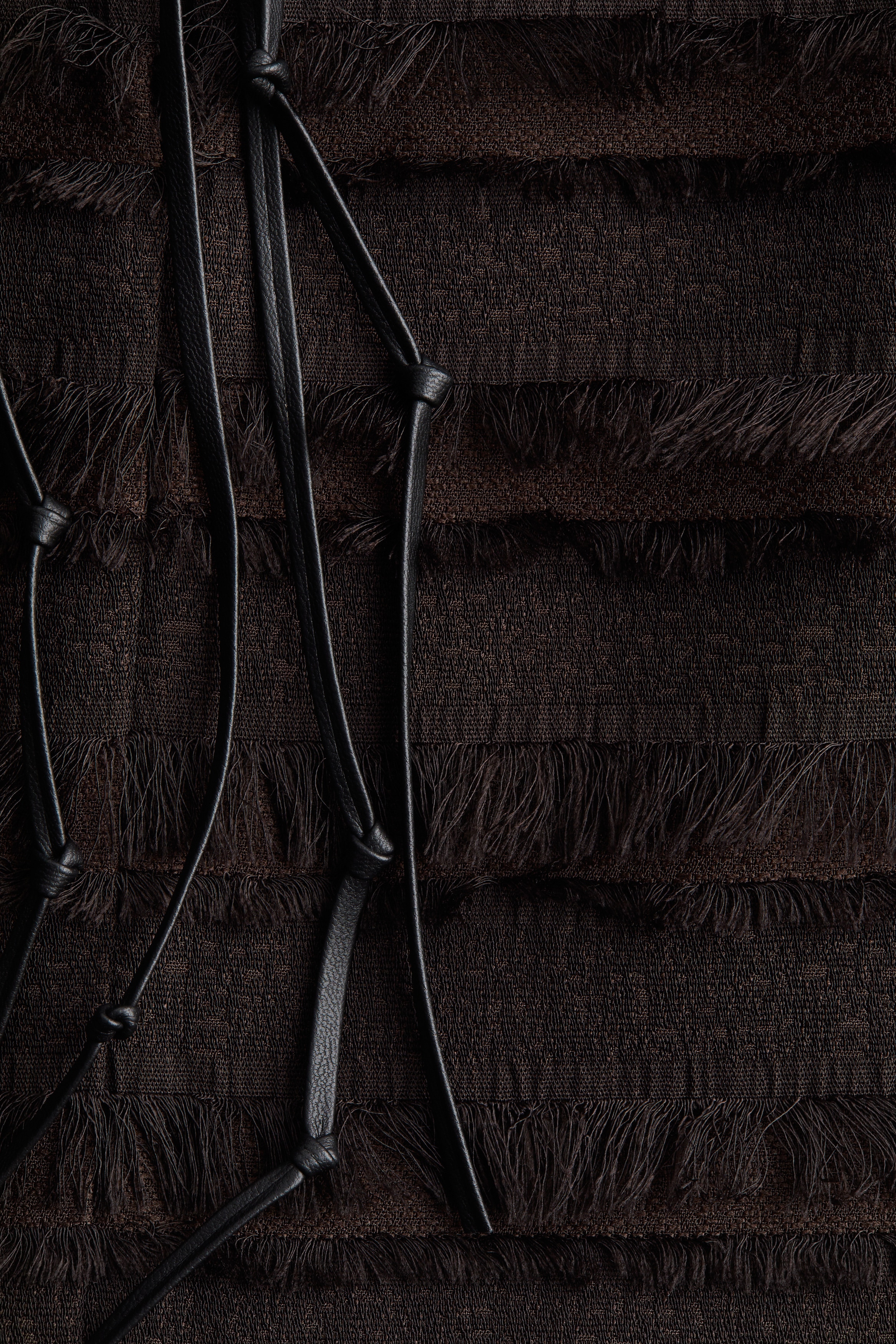 Fringe-trimmed top