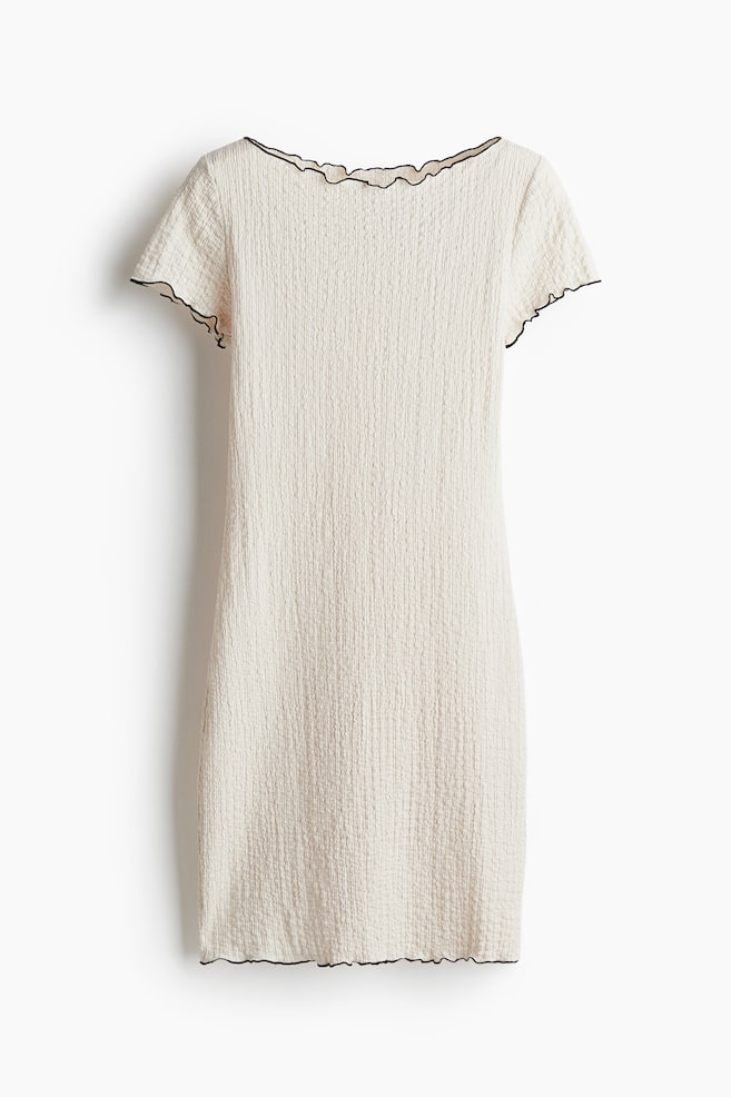 Abito goffrato con dettagli a overlock - Beige chiaro/Nero - 1
