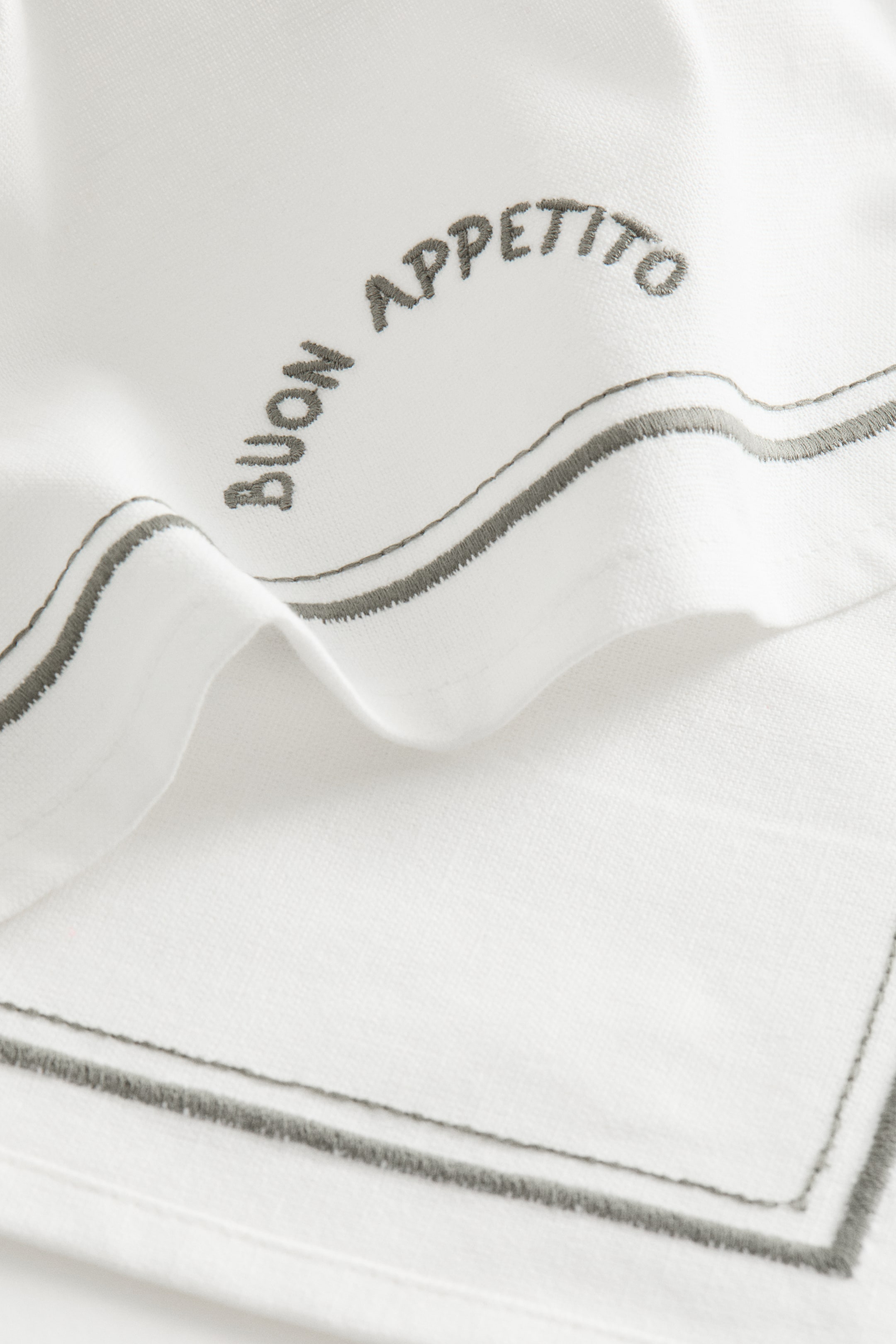 Linge à vaisselle avec motifs brodés