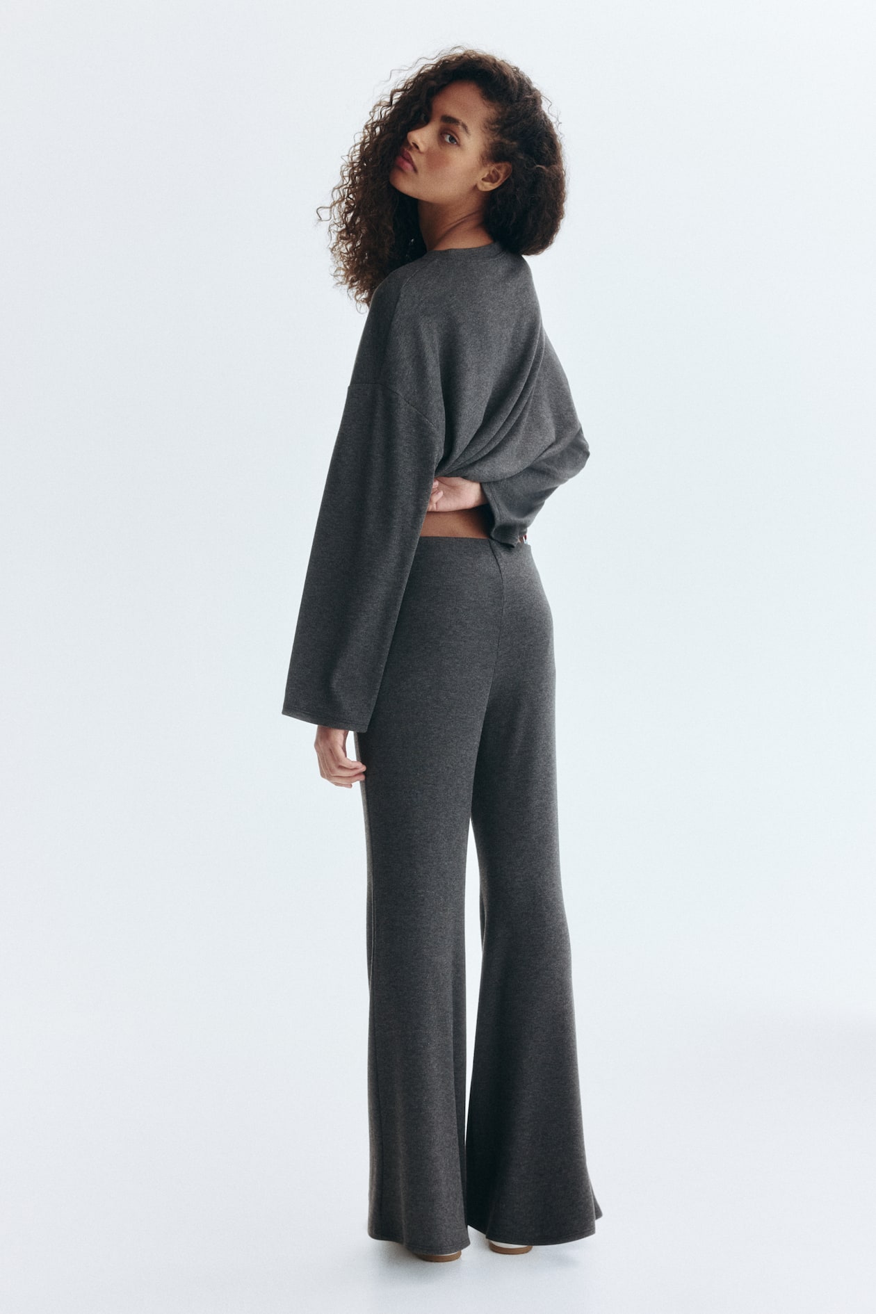Flared fine-knit trousers - image 5