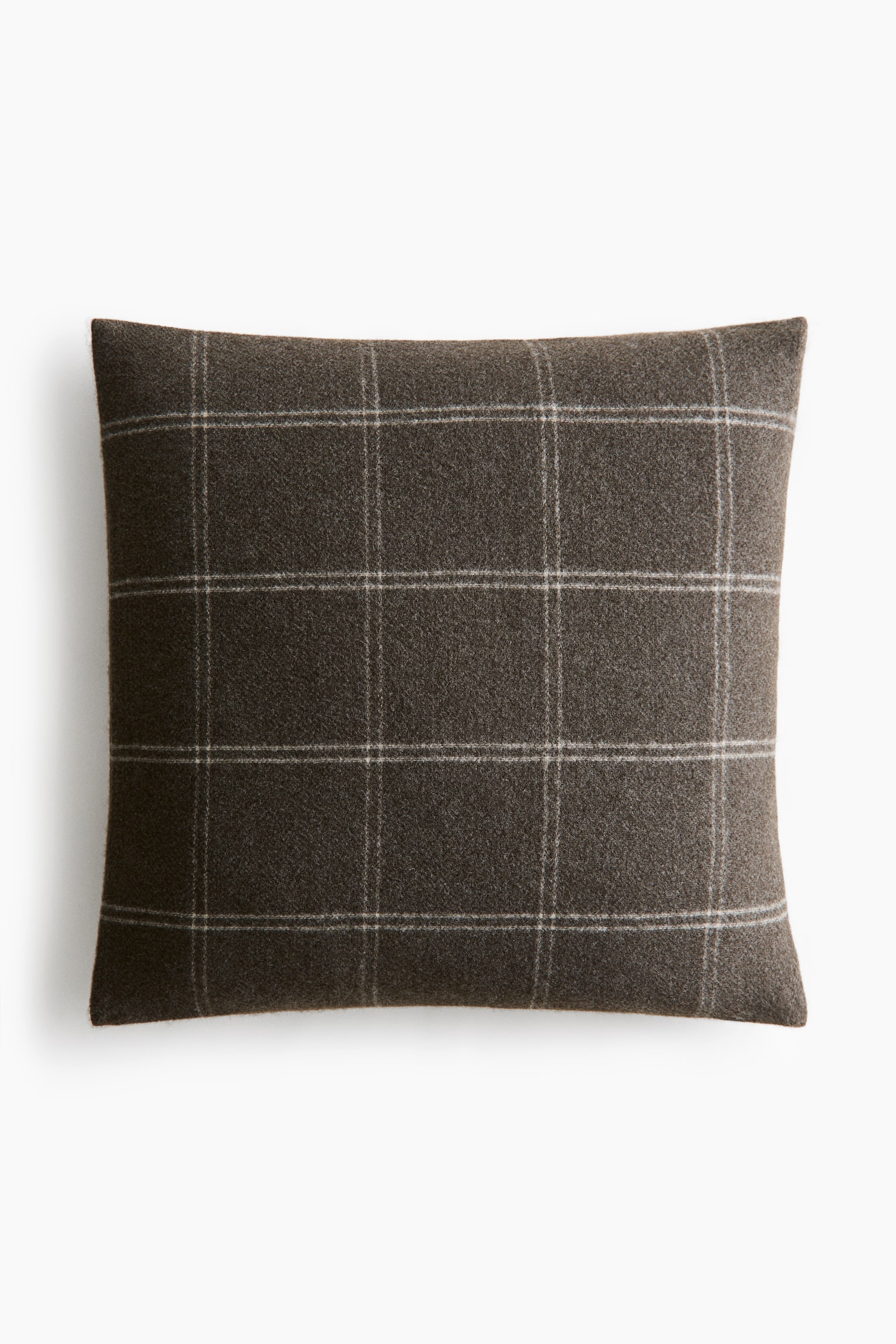 A rectangular cushion is featuring a dark charcoal plaid pattern with thin light grey and off-white windowpane lines. The fabric is appearing with a slightly textured finish.