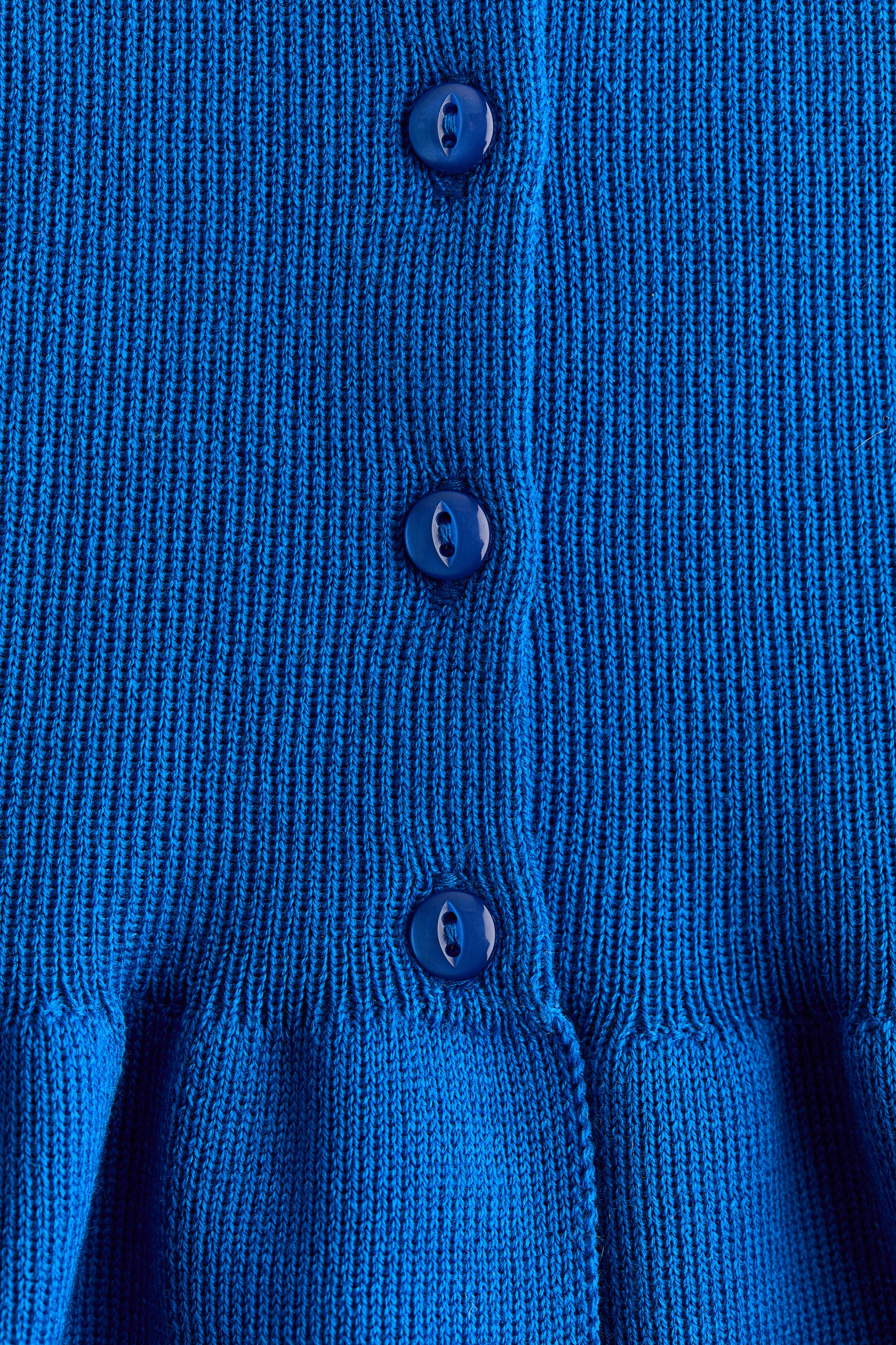Peplum cardigan