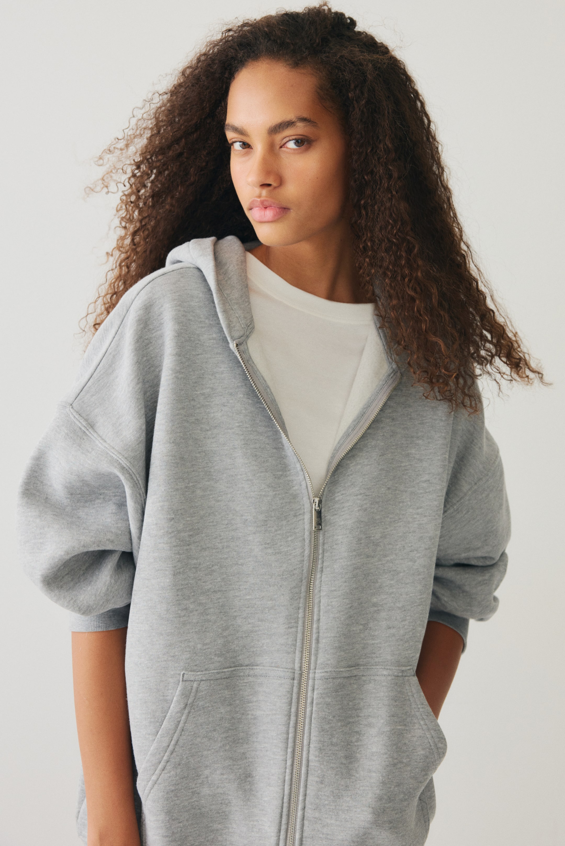 Ver imagen más grande: Chaqueta sudadera oversize con capucha - Gris claro jaspeado - MUJER | H&M ES 1
