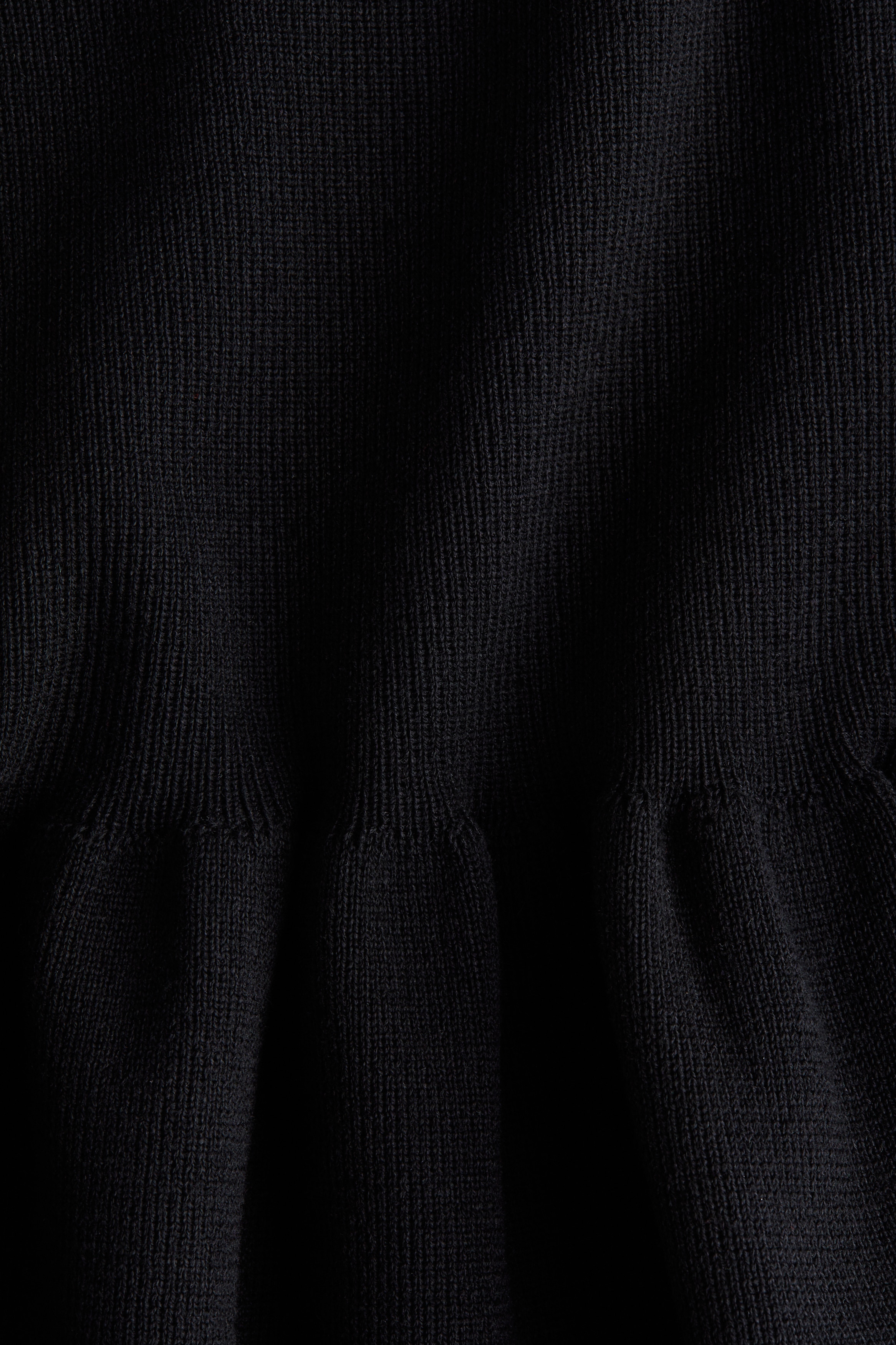 Knitted peplum top