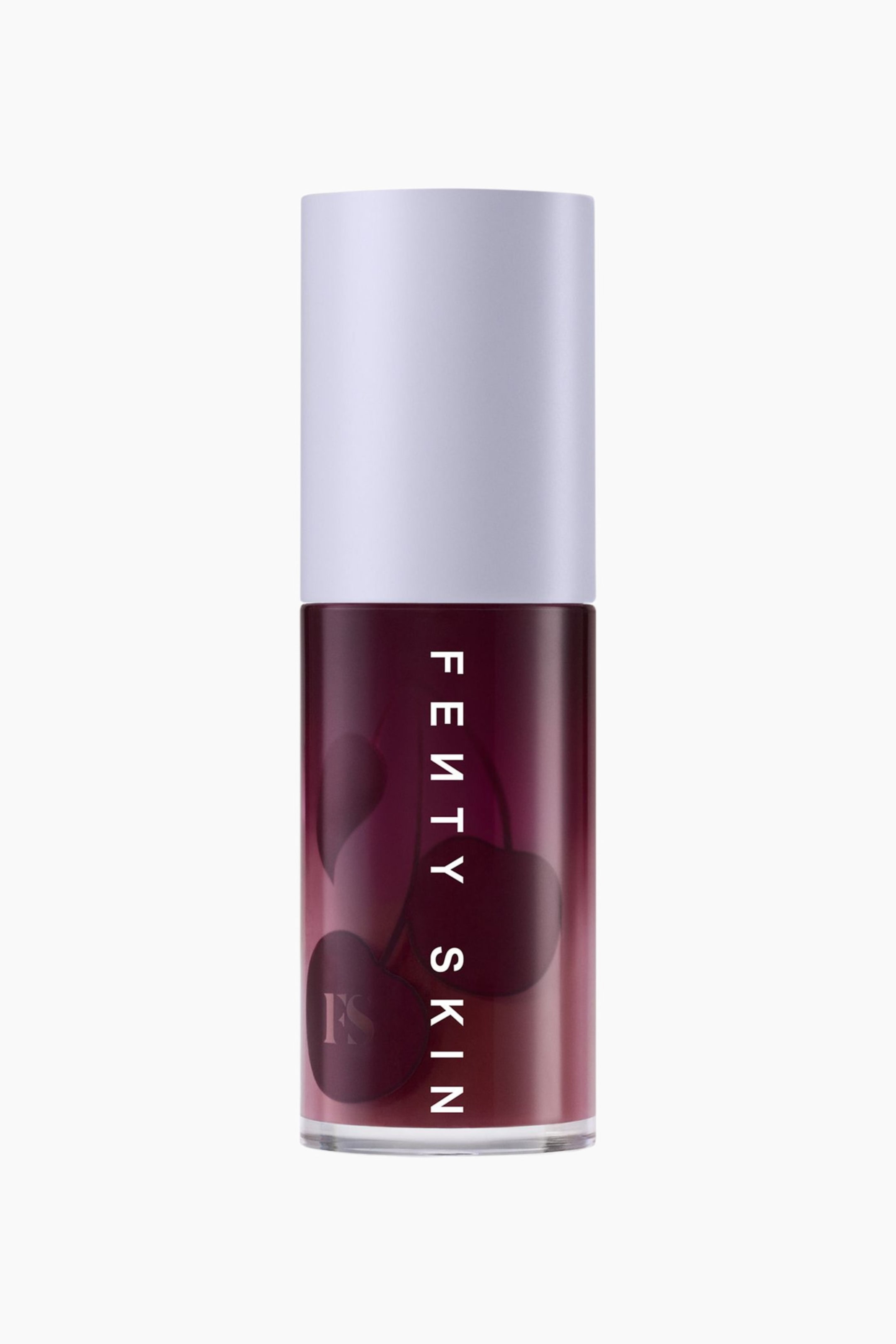 Visa större bild: Treatz Hydrating + Strengthening Lip Oil står upprätt i en framåtvänd vy och visar en genomskinlig cylindrisk tub fylld med en djupt körsbärsfärgad vätska, toppad med ett matt, ljuslavendelfärgat lock. Vertikal vit text med ”FENTY SKIN” löper längs framsidan av tuben, som är dekorerad med mörka körsbärsillustrationer.