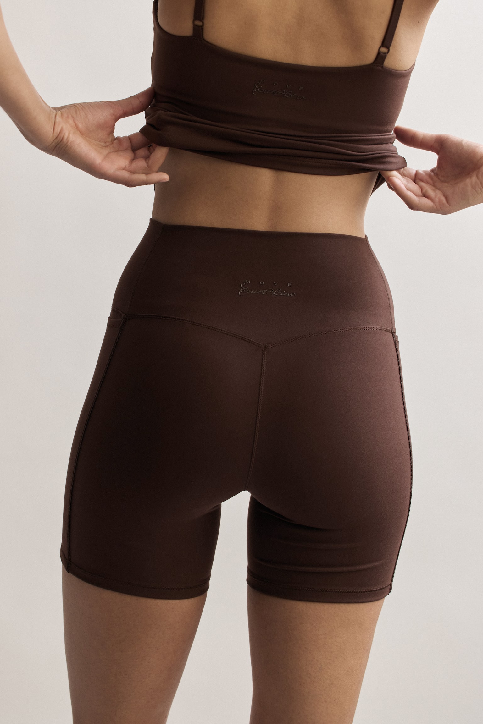 Женские шорты H&M Move Pocket Biker with SoftMove™, цвет: Тёплый коричневый — фото 5