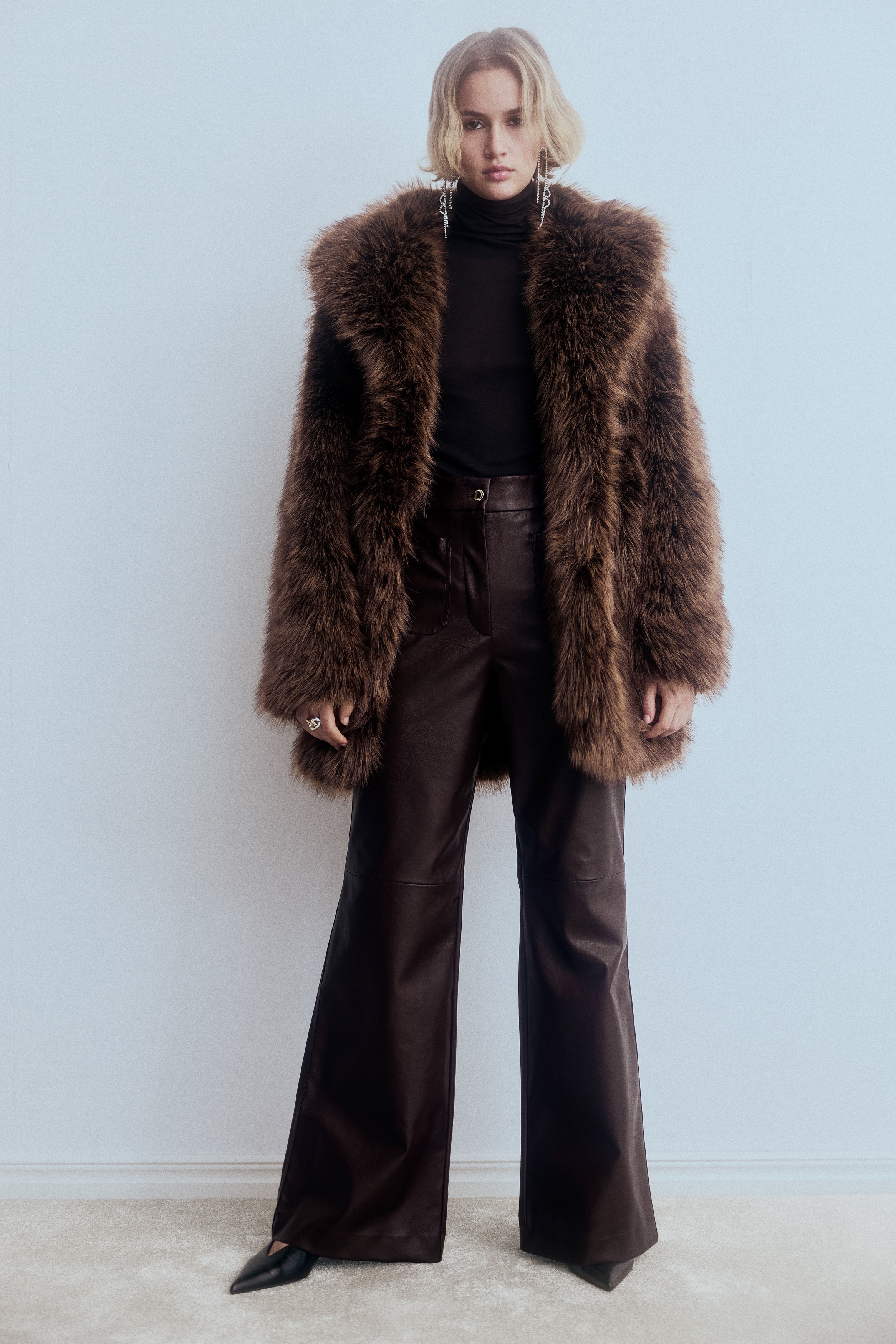Flared coated trousers