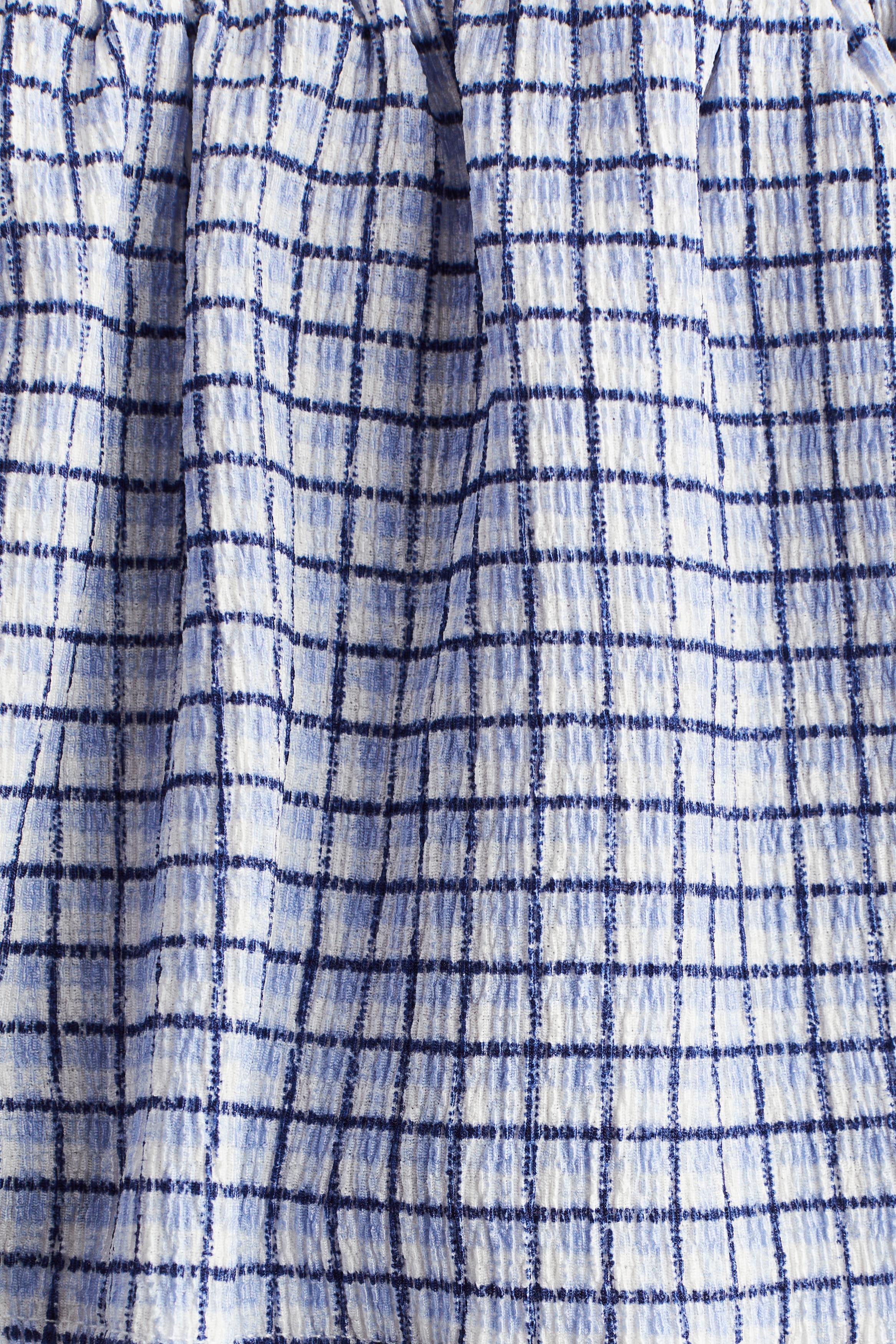 Smocked peplum blouse