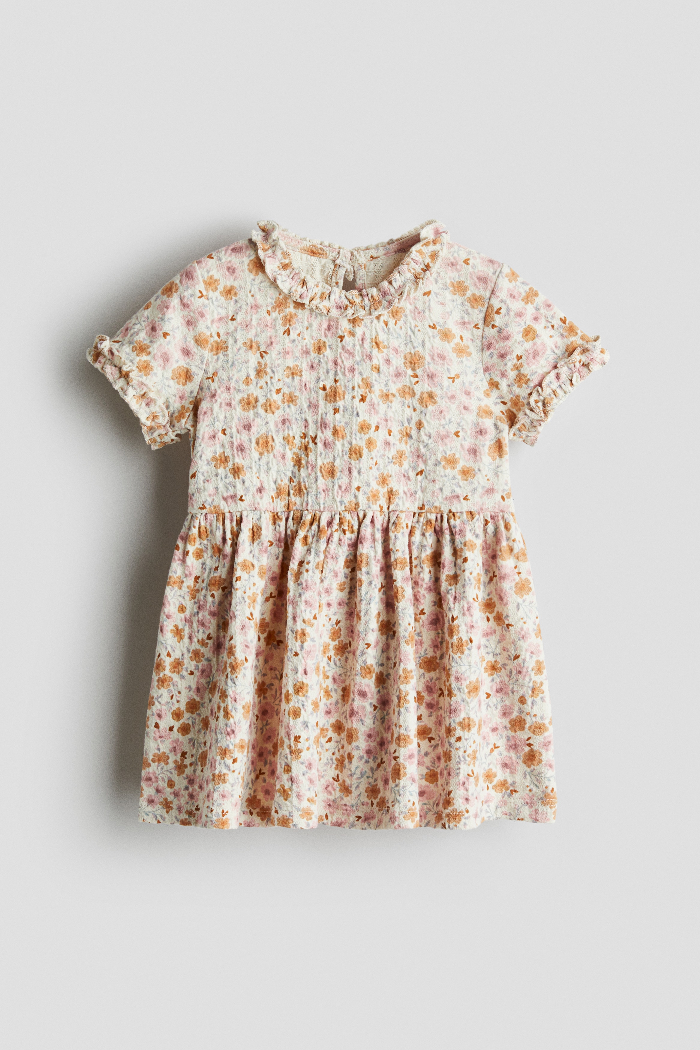 Kjole i jacquardstrikket jersey med flæser - Lys beige/Blomstret/Lysebrun/Støvet lysegrøn