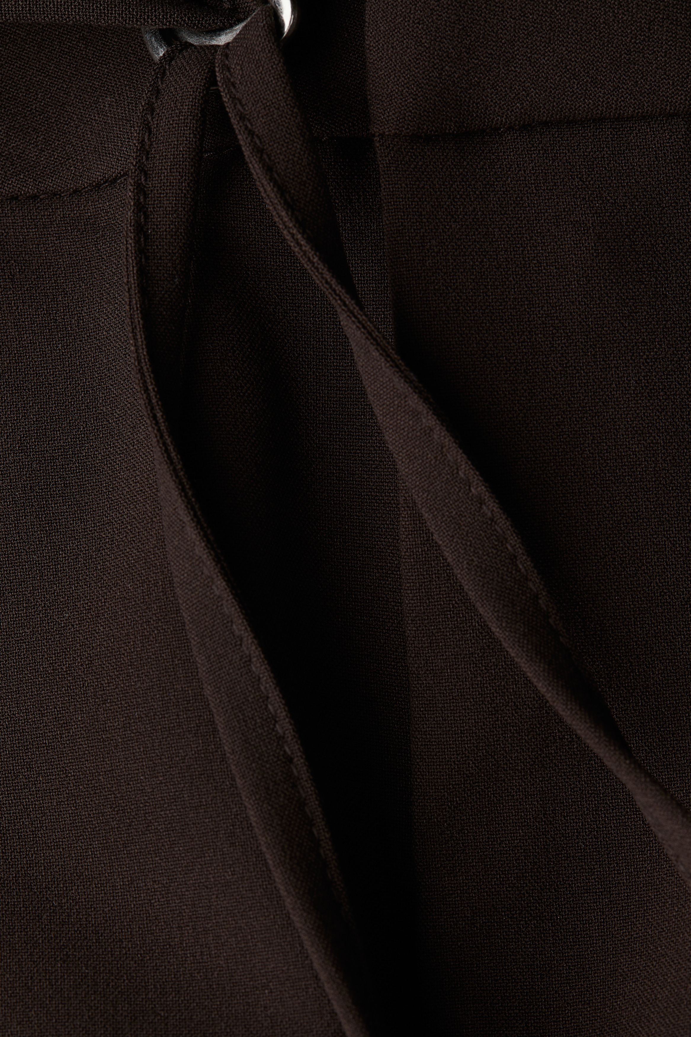 Belted tailored trousers