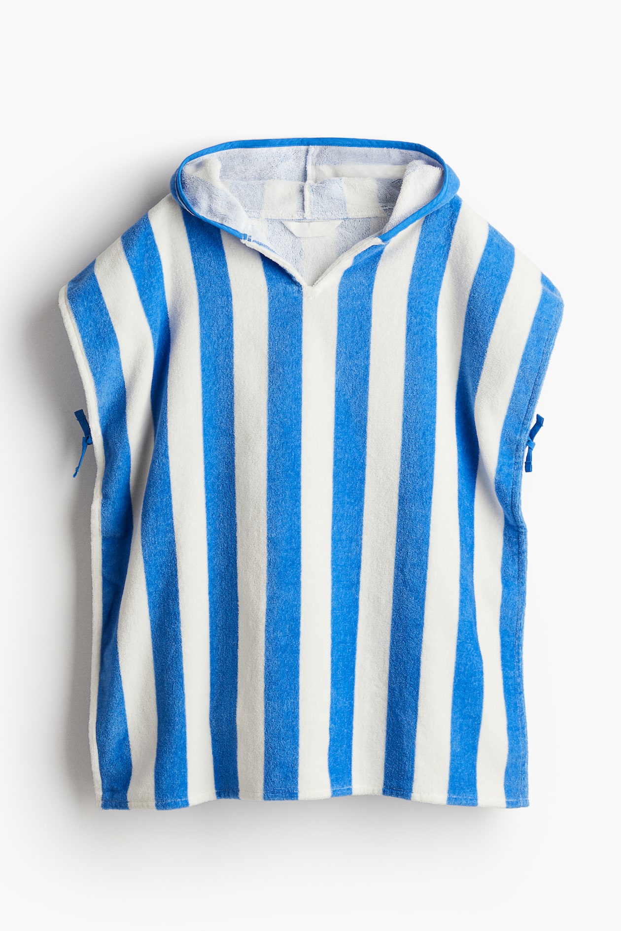 patterned-poncho-towel-bright-blue-striped-home-all-h-m-us
