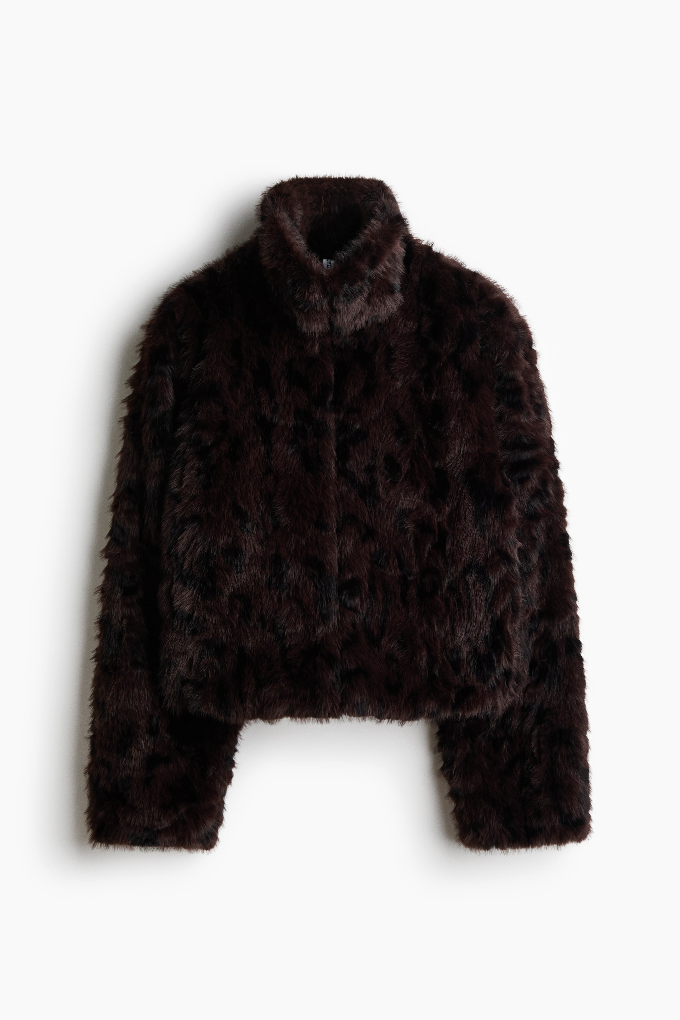 View larger image: A dark brown faux fur jacket is showcasing its front, highlighting a shaggy texture and a high stand-up collar. It is crafted with a cropped cut and long sleeves.