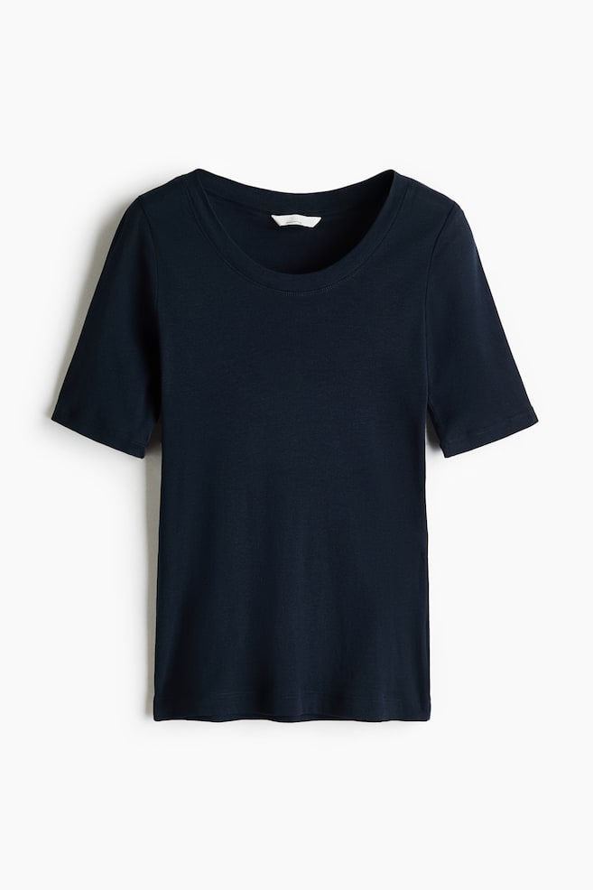 A dark blue fitted t-shirt is showcasing its front view, featuring a ribbed scoop neckline, short sleeves, and a straight-cut hem. - 1