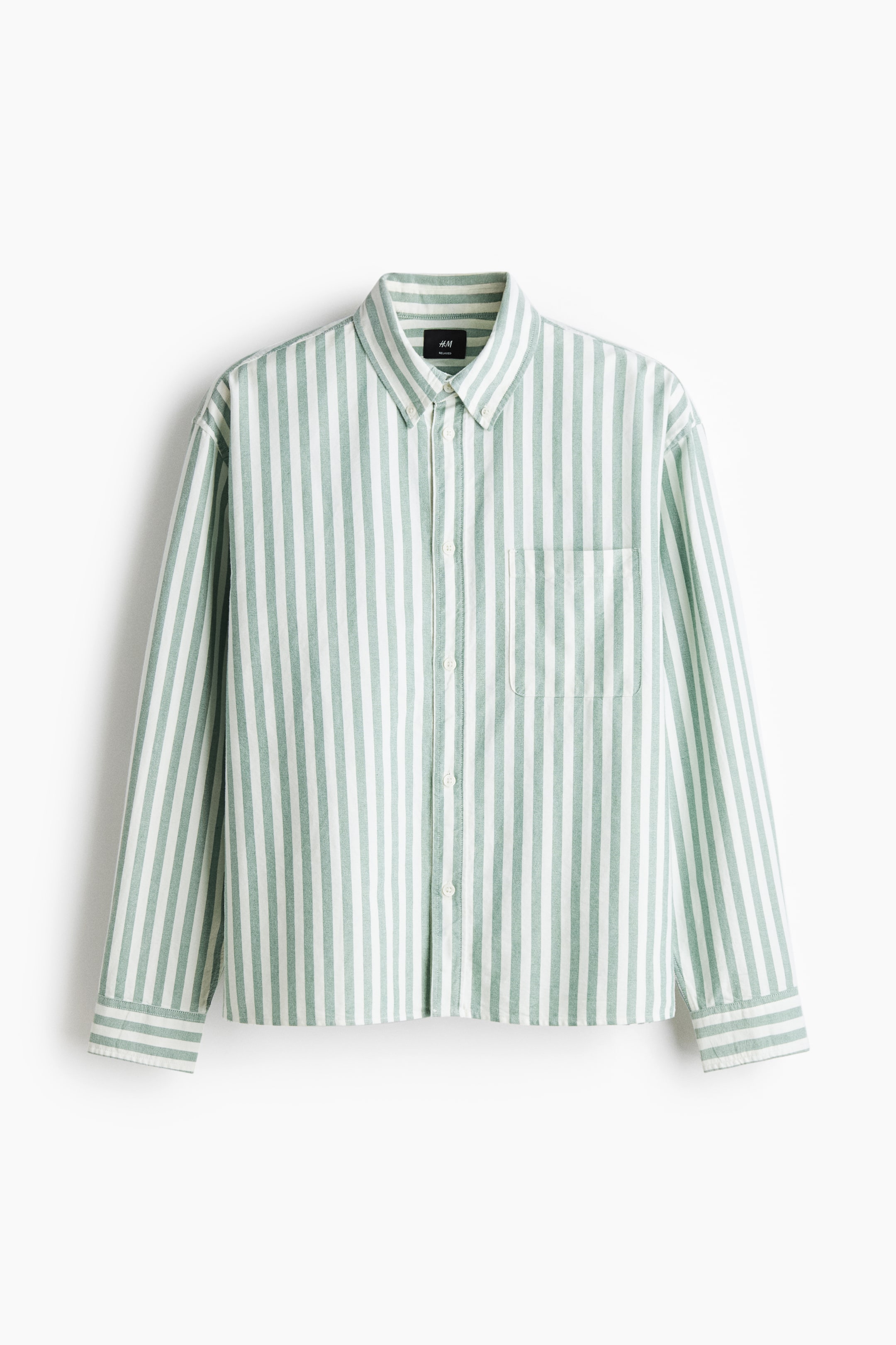 View larger image: A front view of a long-sleeved shirt is featuring alternating vertical stripes in white and light green. It is designed with a spread collar, a full button-front closure with white buttons, and a patch pocket on the left chest.