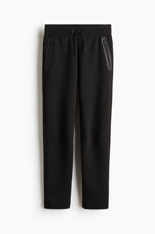 Sports joggers with DryMove™ - Black - 1