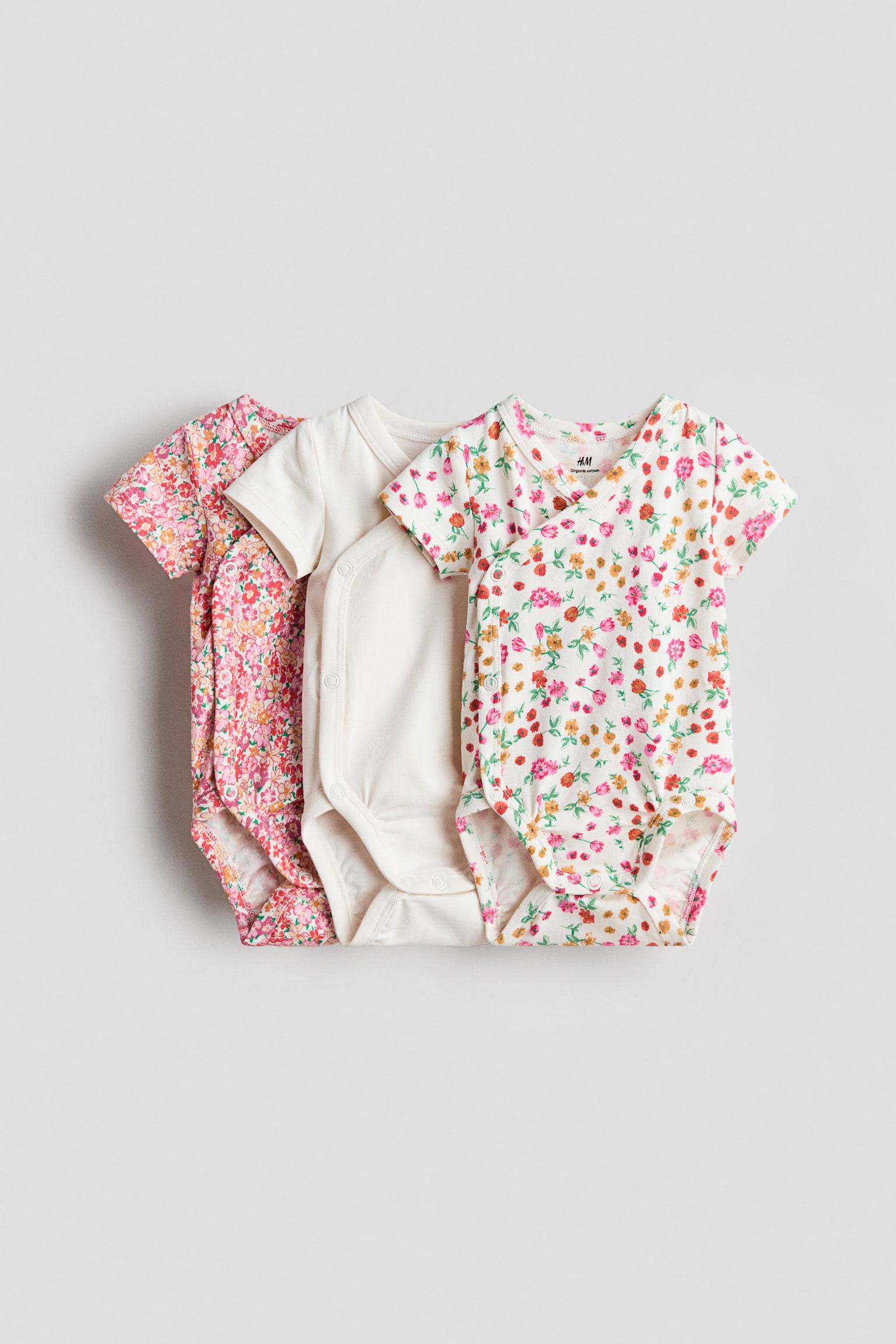 Bộ 3 bộ bodysuit đáp chéo - Màu hồng/Hoa/Màu hồng khói nhạt/Hoa