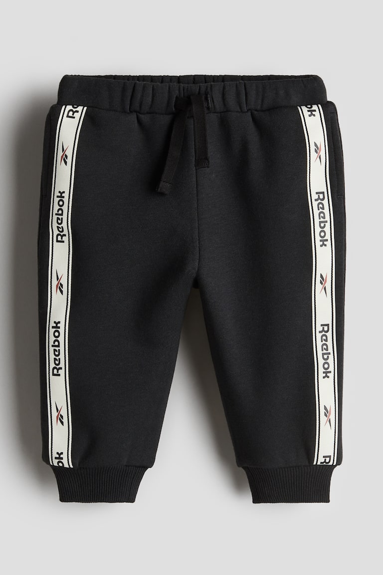Joggers con bande laterali